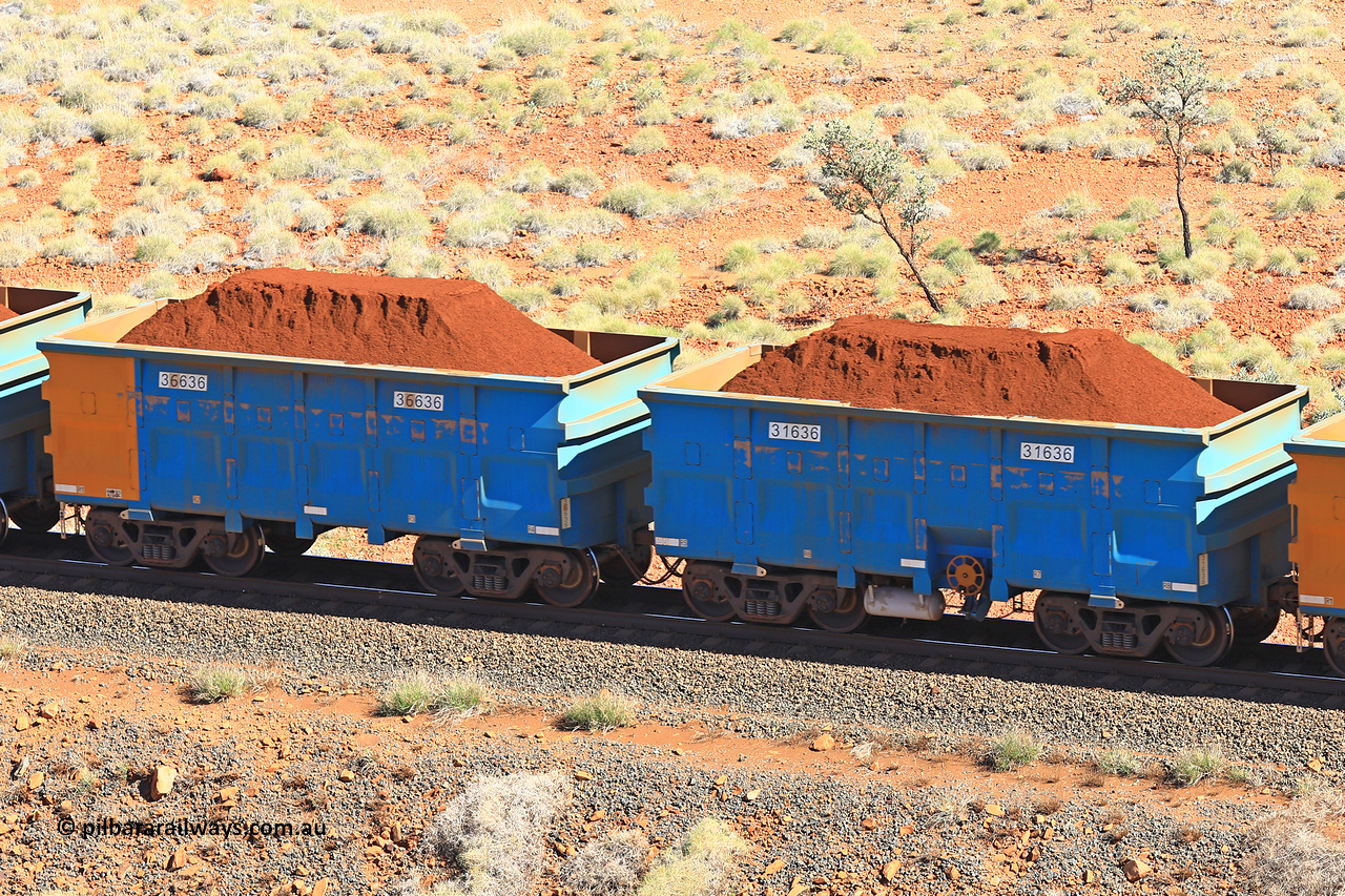 240701 2436
Western Creek, 67 km, one of Rio Tinto's blue rakes with spring assisted park brake and only electronic controlled pneumatic [ECP] braking, waggon pair 31636 is a master and is bar coupled to slave waggon 36636 built by China Northen as a Q type in 11/2022. Captured on July 1, 2024.
Keywords: 31636;36636;Q-type;China-Northern;Rio-ore-waggon;