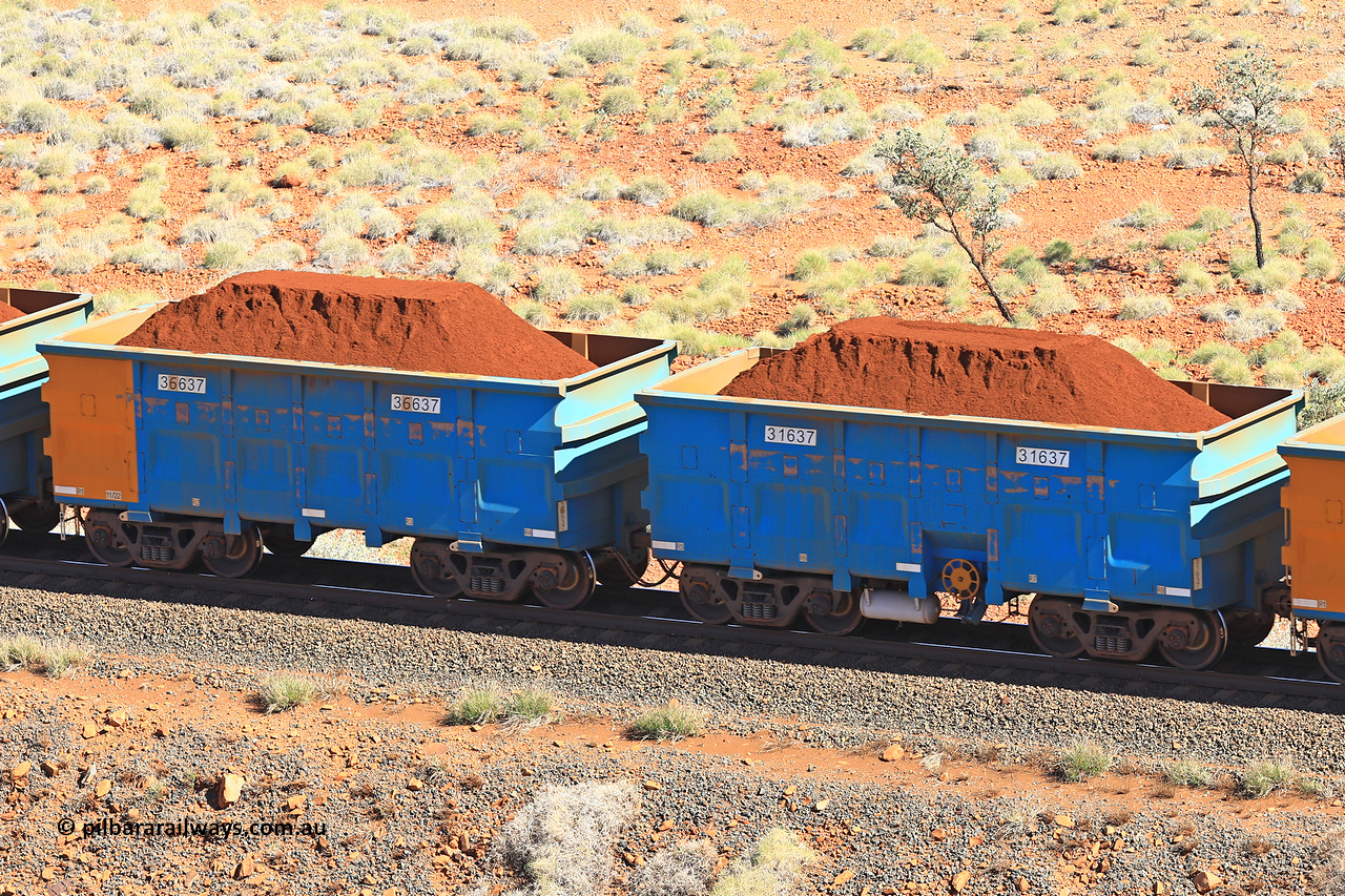 240701 2437
Western Creek, 67 km, one of Rio Tinto's blue rakes with spring assisted park brake and only electronic controlled pneumatic [ECP] braking, waggon pair 31637 is a master and is bar coupled to slave waggon 36637 built by China Northen as a Q type in 11/2022. Captured on July 1, 2024.
Keywords: 31637;36637;Q-type;China-Northern;Rio-ore-waggon;