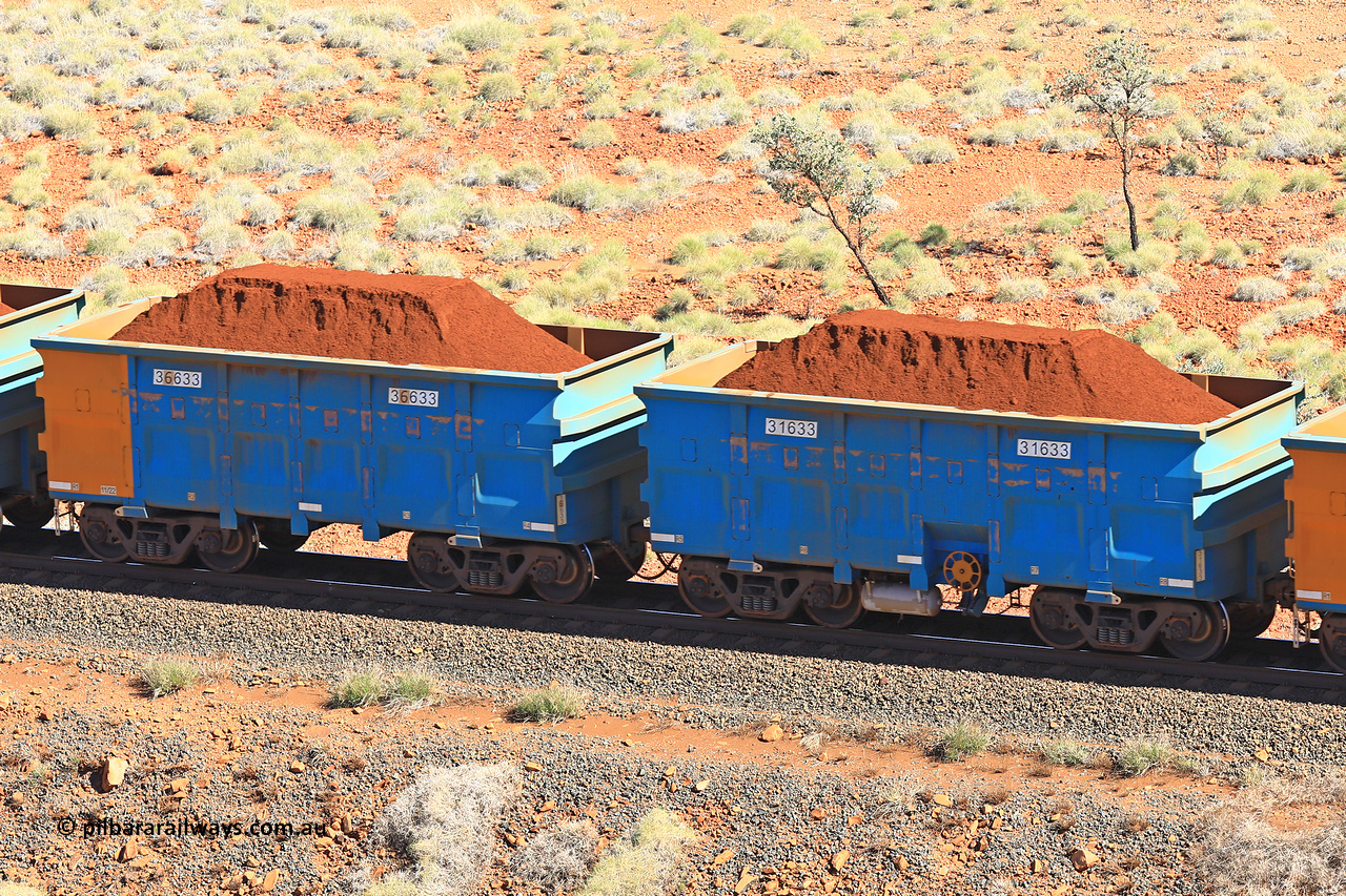 240701 2438
Western Creek, 67 km, one of Rio Tinto's blue rakes with spring assisted park brake and only electronic controlled pneumatic [ECP] braking, waggon pair 31633 is a master and is bar coupled to slave waggon 36633 built by China Northen as a Q type in 11/2022. Captured on July 1, 2024.
Keywords: 31633;36633;Q-type;China-Northern;Rio-ore-waggon;