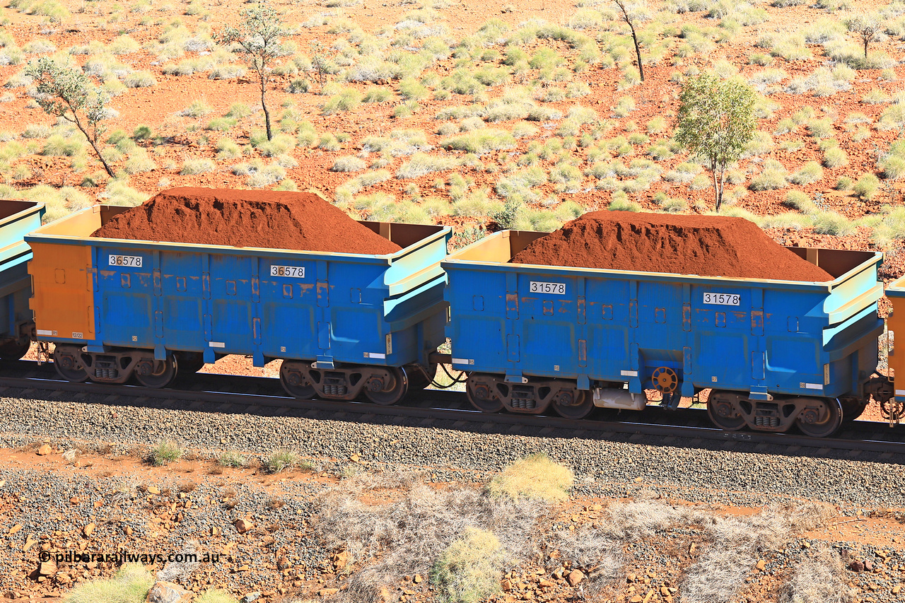 240701 2492
Western Creek, 67 km, one of Rio Tinto's blue rakes with spring assisted park brake and only electronic controlled pneumatic [ECP] braking, waggon pair 31578 is a master and is bar coupled to slave waggon 36578 built by China Northen as a Q type in 12/2022. Captured on July 1, 2024.
Keywords: 31578;36578;Q-type;China-Northern;Rio-ore-waggon;