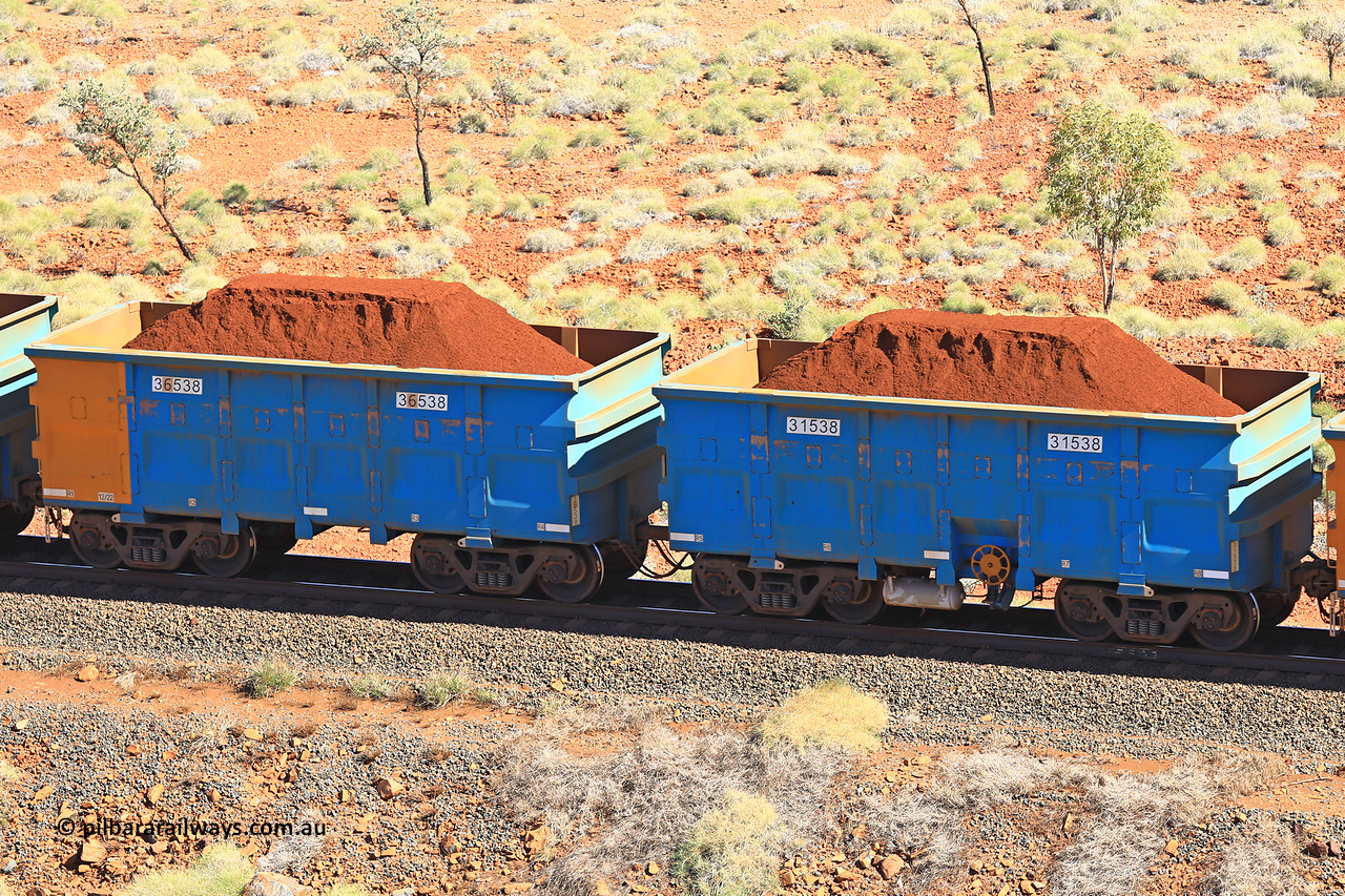 240701 2493
Western Creek, 67 km, one of Rio Tinto's blue rakes with spring assisted park brake and only electronic controlled pneumatic [ECP] braking, waggon pair 31538 is a master and is bar coupled to slave waggon 36538 built by China Northen as a Q type in 12/2022. Captured on July 1, 2024.
Keywords: 31538;36538;Q-type;China-Northern;Rio-ore-waggon;