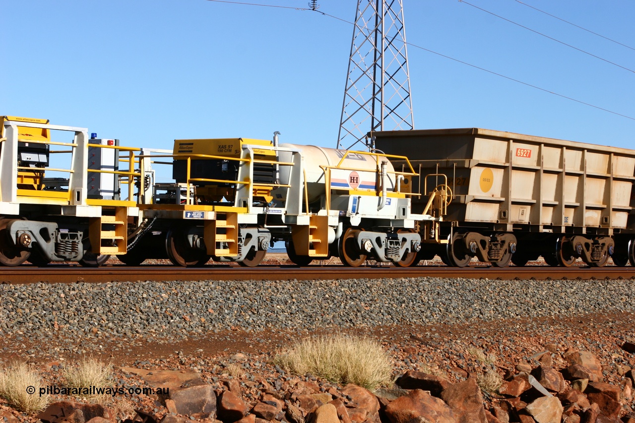 060723 7685
Original Hamersley Iron compressor waggon set IC-6 which were made from cutting down condemned ore waggons and then fitting Atlas Copco XAS 97 air compressors, receiver tanks and fuel tanks. Seen here on the causeway just outside 7 Mile. 23rd July 2006.
Keywords: IC-6;IC-7;rio-compressor-waggon;