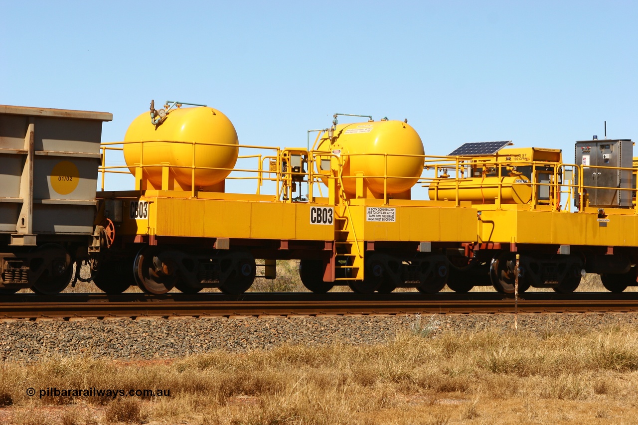060723 7764
Rio Tinto compressor waggon set CB 03, receiver waggon with two air tanks or receivers. These are built on former ore waggons that have been cut down. Seen here just outside of 7 Mile. 23rd July 2006.
Keywords: CB03;rio-compressor-waggon;