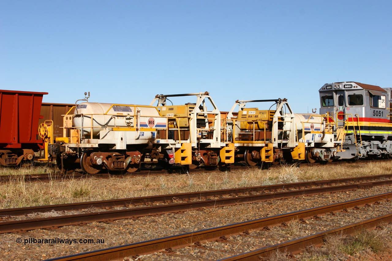 060723 7845
Original Hamersley Iron compressor waggon sets IC-1 and IC-3 which were made from cutting down condemned ore waggons and then fitting Atlas Copco XAS 97 air compressors, receiver tanks and fuel tanks. The compressors have been fitted to a swing cradle to limit the in-train forces during the unloading process. 7 Mile 23rd July 2006.
Keywords: IC-1;IC-3;rio-compressor-waggon;