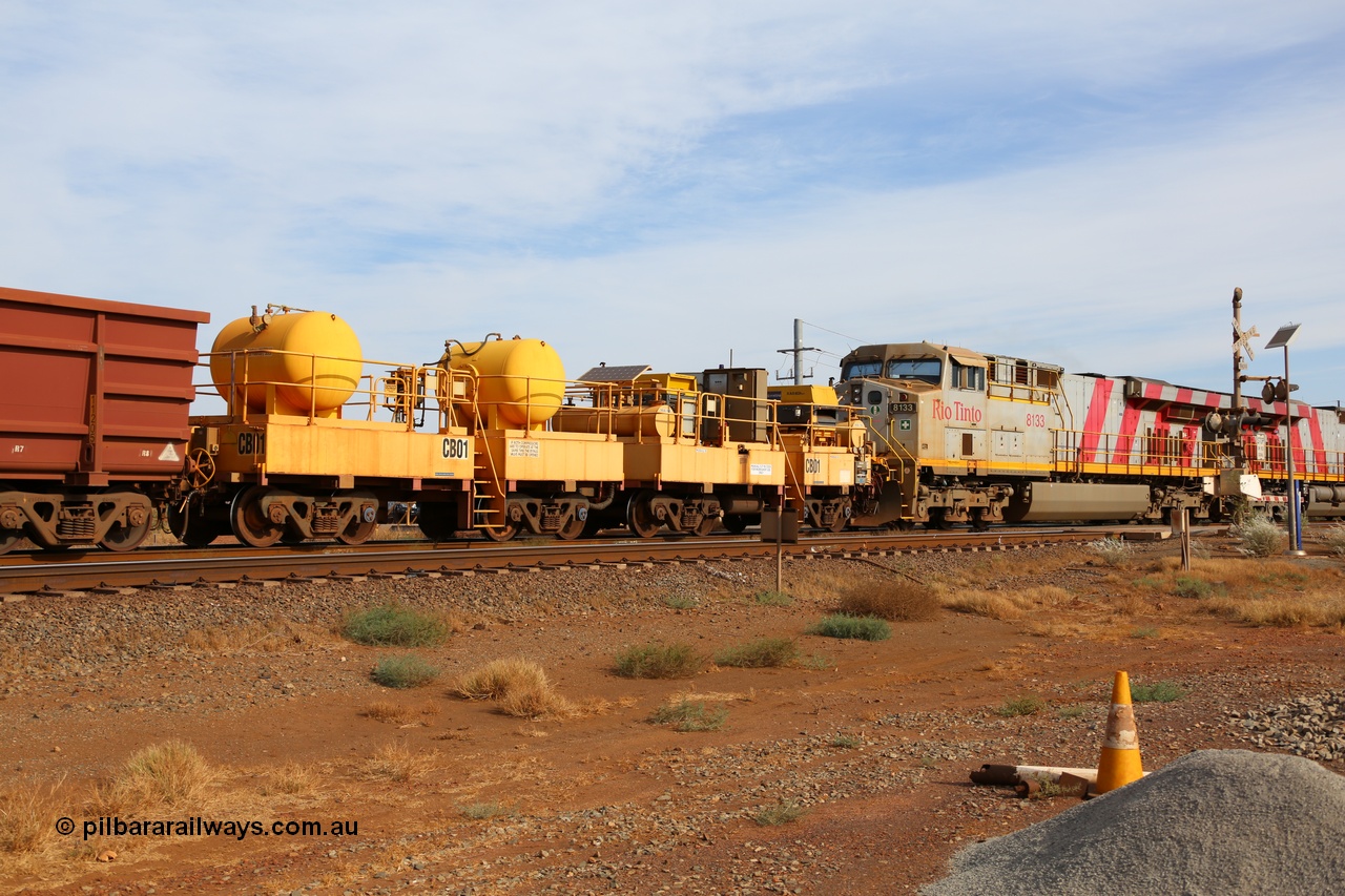 141124 7092
Rio Tinto compressor waggon set leader CB 01, compressor control waggon with two diesel powered Atlas Copco XAS 97's behind the loco and the receiver waggon with two air tanks or receivers. Note the waggons are cut down ore waggons. Seen here at 7 Mile, Dampier on 24th November 2014.
Keywords: CB01;rio-compressor-waggon;