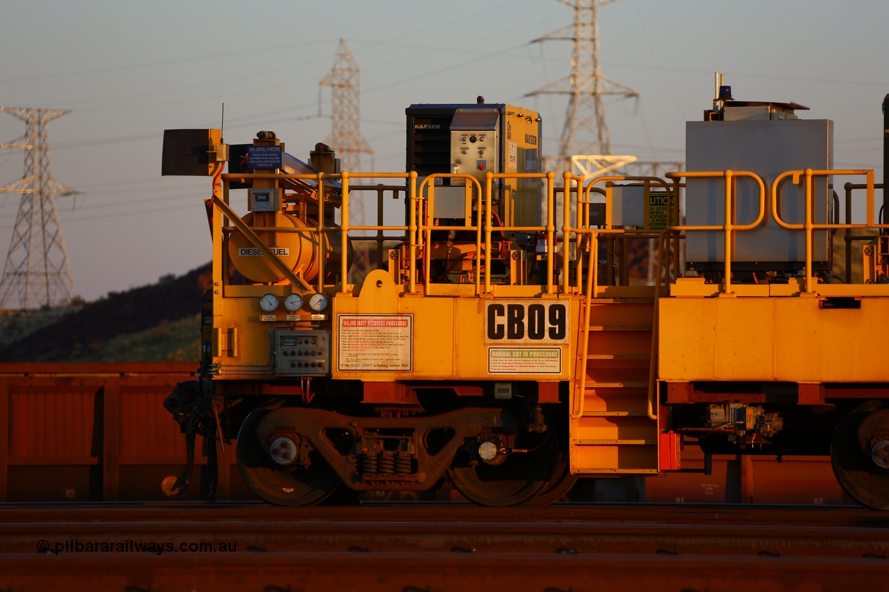 170510 8284
Rio Tinto compressor waggon set CB 09, compressor control waggon with two diesel powered Kaeser M57 Utility air compressors. Note the waggons are modified ore waggon frames. Seen here at Cape Lambert. 10th May 2017.
Keywords: CB09;rio-compressor-waggon;