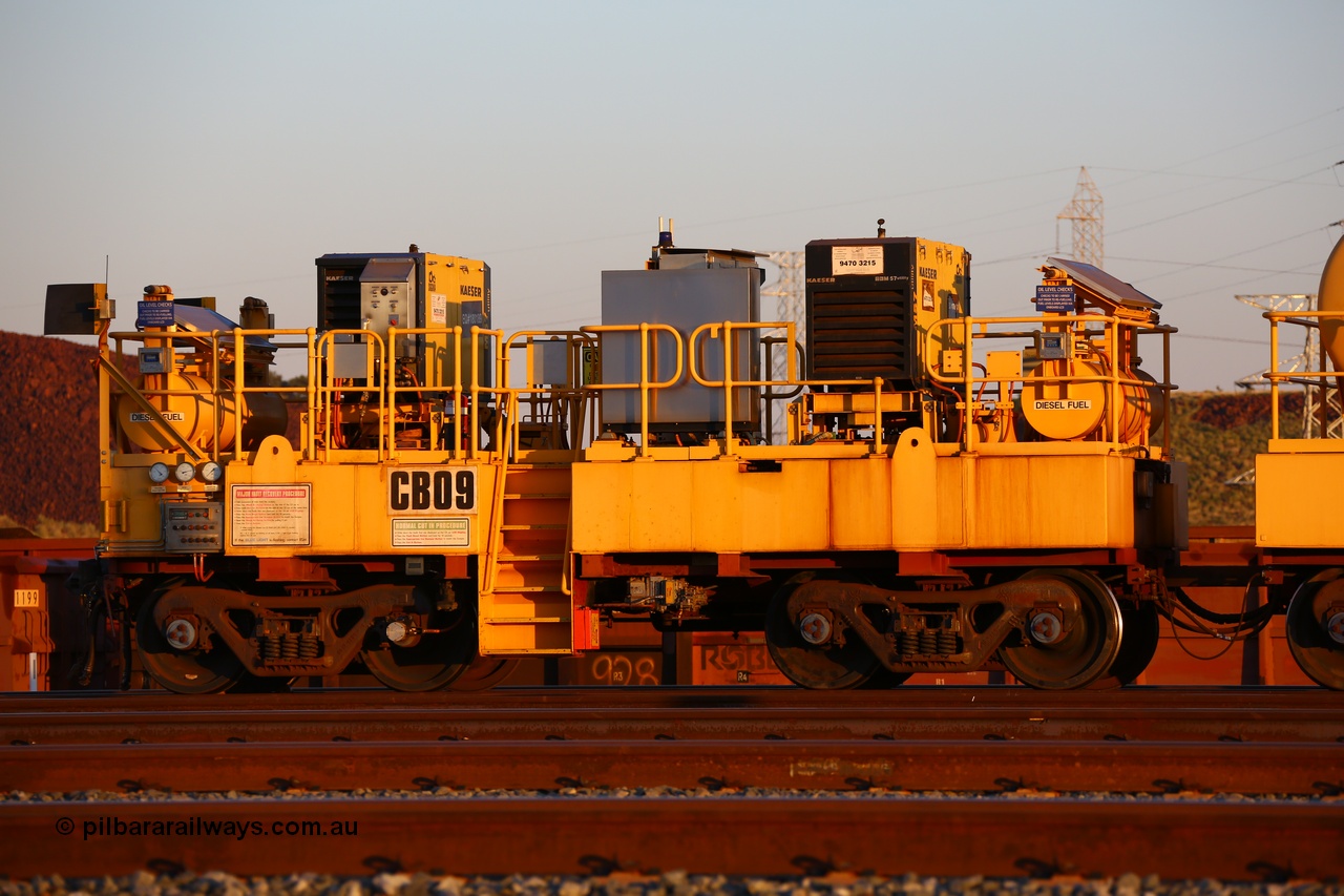 170510 8293
Rio Tinto compressor waggon set CB 09, compressor control waggon with two diesel powered Kaeser M57 Utility air compressors. Note the waggons are modified ore waggon frames. Seen here at Cape Lambert. 10th May 2017.
Keywords: CB09;rio-compressor-waggon;