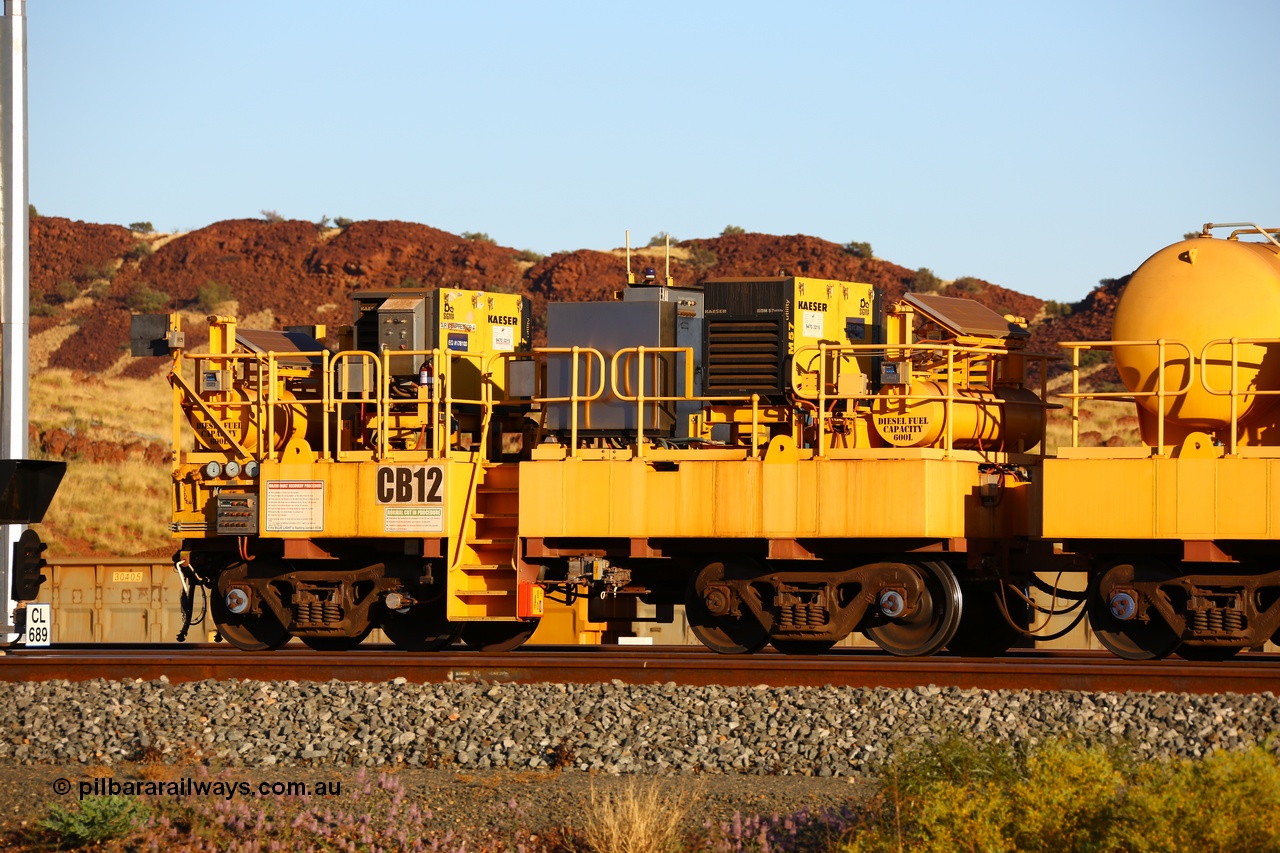 170728 09690
Rio Tinto compressor waggon set CB 12, compressor control waggon with two diesel powered Kaeser M57 Utility air compressors. Note the waggons are modified ore waggon frames. Seen here at Cape Lambert. 28th July 2017.
Keywords: CB12;rio-compressor-waggon;