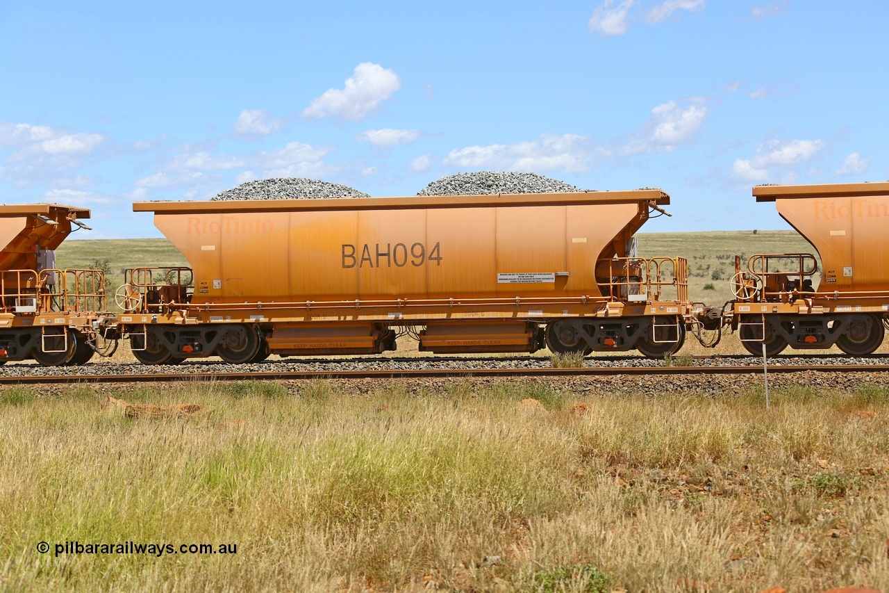 210322 9572
Near Gecko on Rio Tinto's Dampier - Tom Price line is Chinese built ballast waggon BAH 094 on a loaded ballast rake. Location is roughly [url=https://goo.gl/maps/XZkGLreipQwHrTjw9]here[/url]. 22nd March 2021.
Keywords: BAH-type;BAH094;Rio-ballast-waggon;