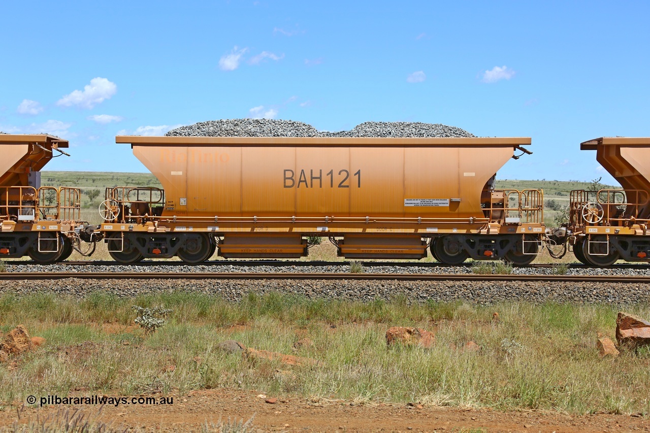 210322 9574
Near Gecko on Rio Tinto's Dampier - Tom Price line is Chinese built ballast waggon BAH 121 on a loaded ballast rake. Location is roughly [url=https://goo.gl/maps/XZkGLreipQwHrTjw9]here[/url]. 22nd March 2021.
Keywords: BAH-type;BAH121;Rio-ballast-waggon;