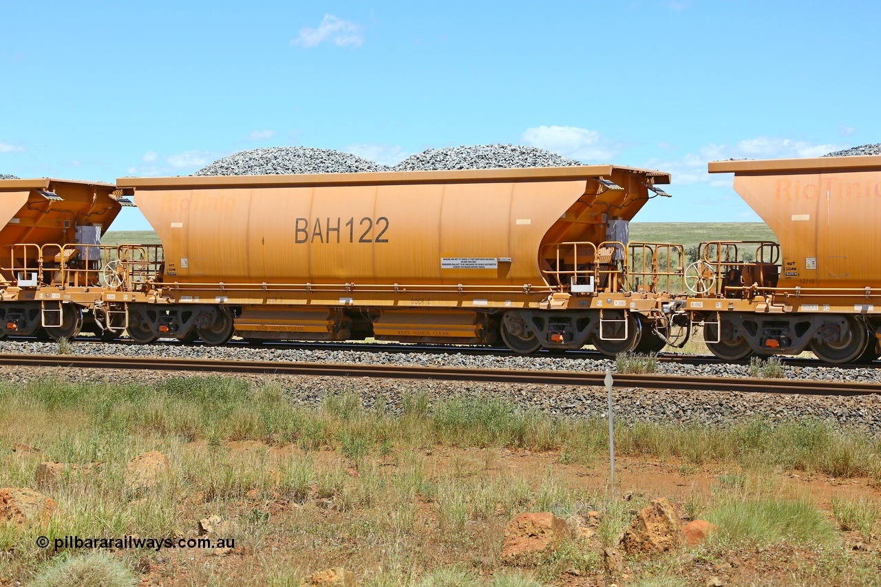 210322 9580
Near Gecko on Rio Tinto's Dampier - Tom Price line is Chinese built ballast waggon BAH 122 on a loaded ballast rake. Location is roughly [url=https://goo.gl/maps/XZkGLreipQwHrTjw9]here[/url]. 22nd March 2021.
Keywords: BAH-type;BAH122;Rio-ballast-waggon;