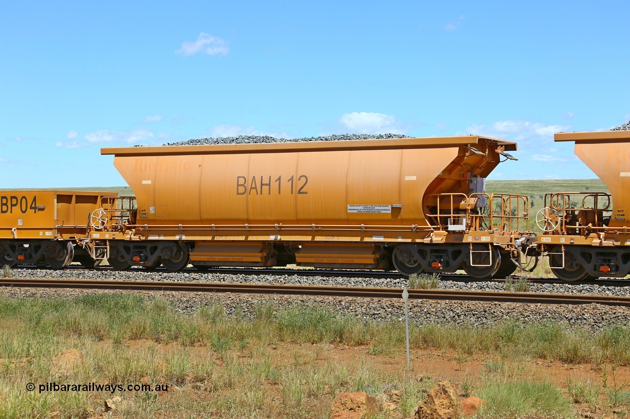 210322 9581
Near Gecko on Rio Tinto's Dampier - Tom Price line is Chinese built ballast waggon BAH 112 on a loaded ballast rake. Location is roughly [url=https://goo.gl/maps/XZkGLreipQwHrTjw9]here[/url]. 22nd March 2021.
Keywords: BAH-type;BAH112;Rio-ballast-waggon;