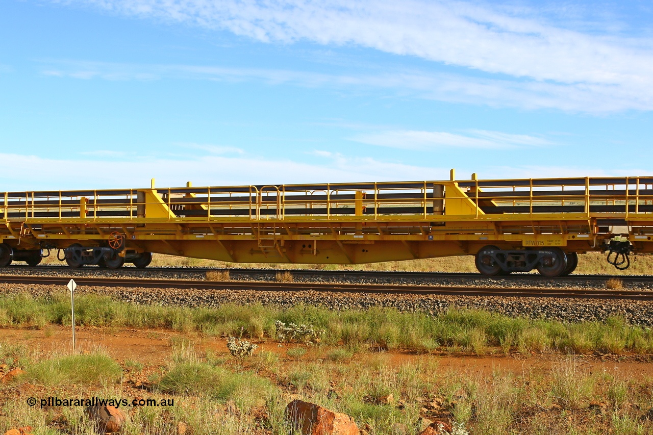 210510 1105
Near Gull on the Rio Tinto Dampier - Tom Price line at the 101.5 km, RTW type intermediate rail waggon RTW 015 on Rio Tinto's Gemco Rail built rail train consist. 10th May 2021. [url=https://goo.gl/maps/9WbRn1E4vP6a1YbN8]Location[/url].
Keywords: RTW-type;RTW015;Gemco-Rail-WA;