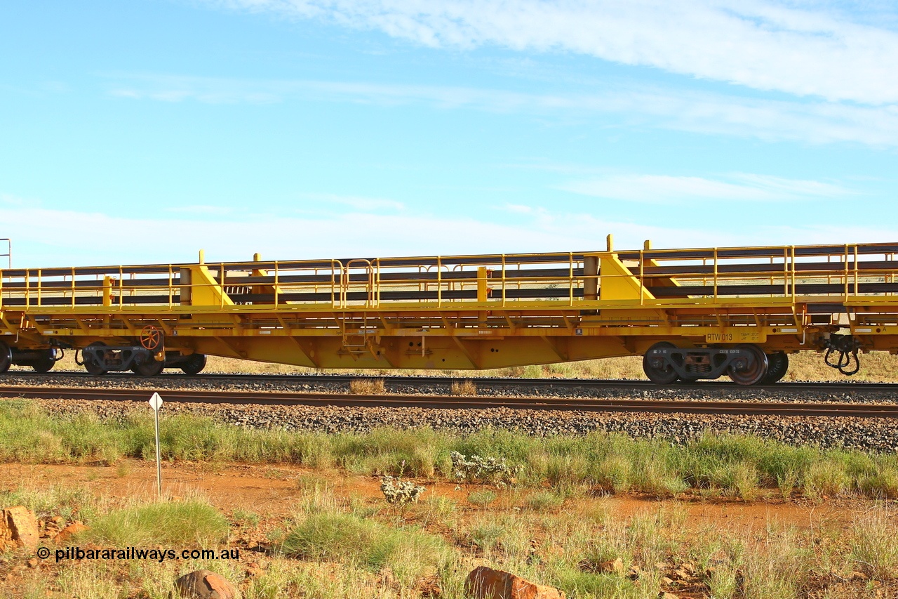 210510 1107
Near Gull on the Rio Tinto Dampier - Tom Price line at the 101.5 km, RTW type intermediate rail waggon RTW 013 on Rio Tinto's Gemco Rail built rail train consist. 10th May 2021. [url=https://goo.gl/maps/9WbRn1E4vP6a1YbN8]Location[/url].
Keywords: RTW-type;RTW013;Gemco-Rail-WA;