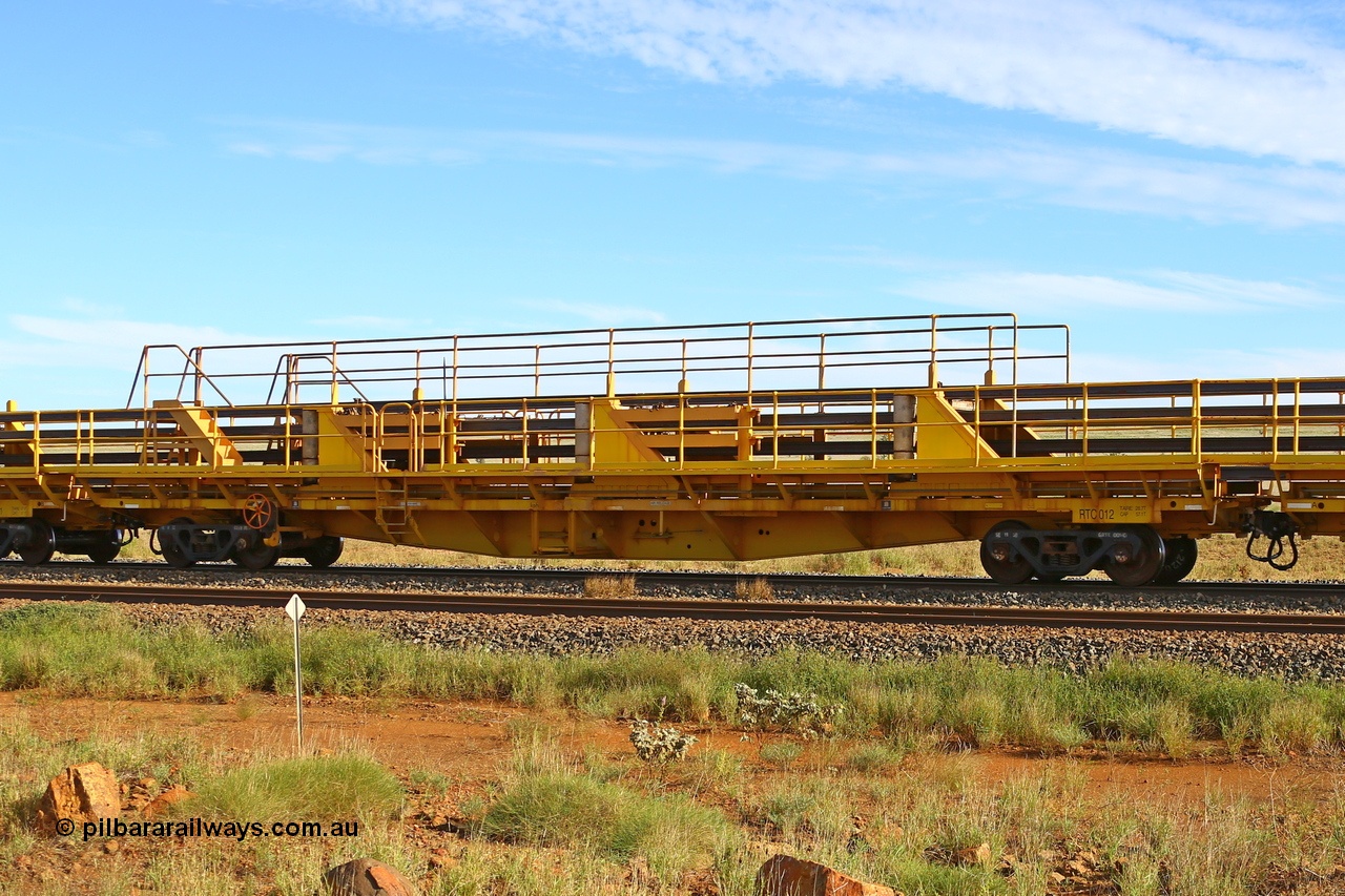 210510 1108
Near Gull on the Rio Tinto Dampier - Tom Price line at the 101.5 km, RTC type centre rail waggon RTC 012 on Rio Tinto's Gemco Rail built rail train consist. 10th May 2021. [url=https://goo.gl/maps/9WbRn1E4vP6a1YbN8]Location[/url].
Keywords: RTC-type;RTC012;Gemco-Rail-WA;