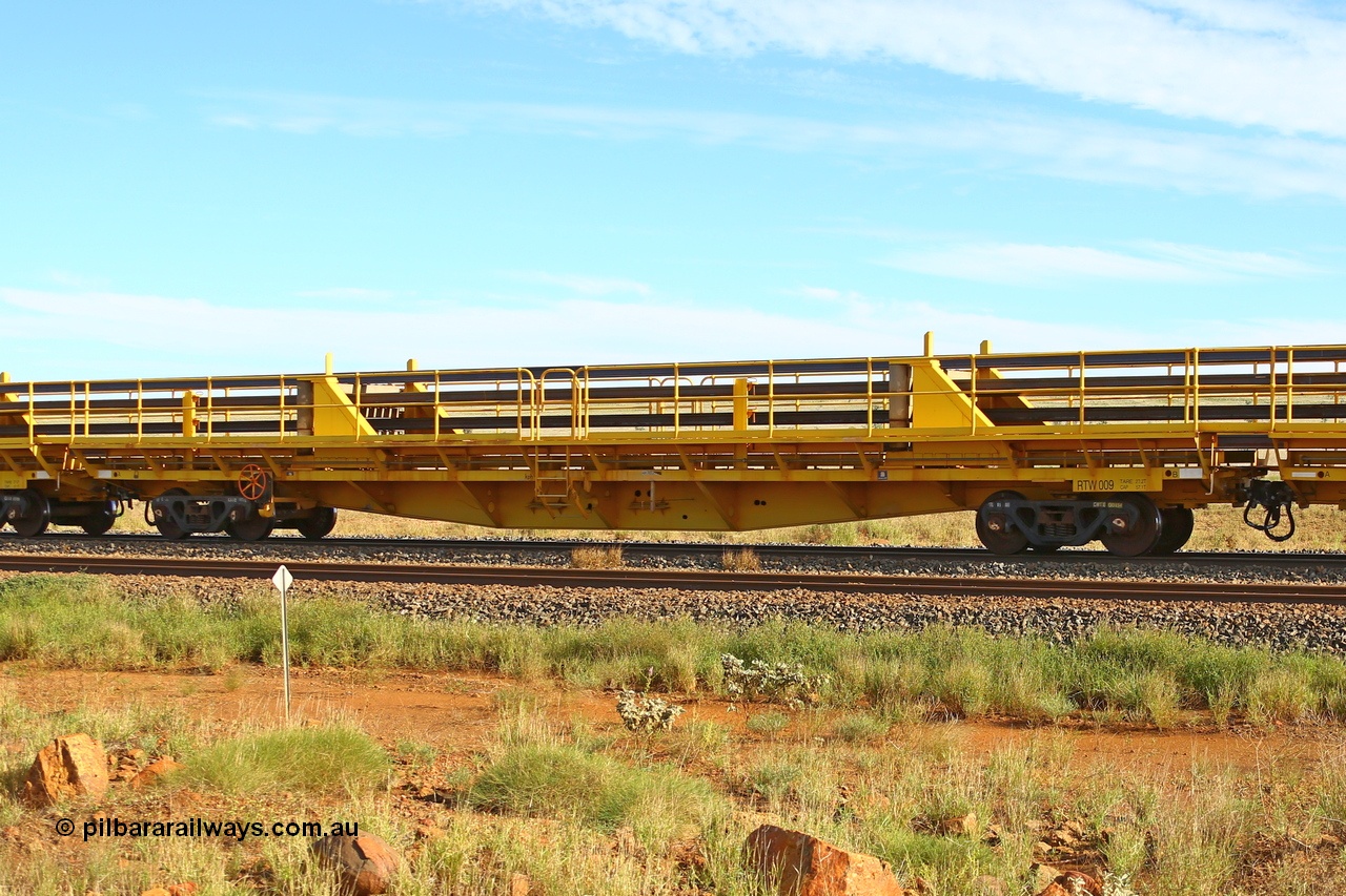 210510 1111
Near Gull on the Rio Tinto Dampier - Tom Price line at the 101.5 km, RTW type intermediate rail waggon RTW 009 on Rio Tinto's Gemco Rail built rail train consist. 10th May 2021. [url=https://goo.gl/maps/9WbRn1E4vP6a1YbN8]Location[/url].
Keywords: RTW-type;RTW009;Gemco-Rail-WA;