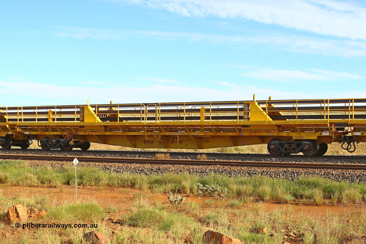 210510 1113
Near Gull on the Rio Tinto Dampier - Tom Price line at the 101.5 km, RTW type intermediate rail waggon RTW 007 on Rio Tinto's Gemco Rail built rail train consist. 10th May 2021. [url=https://goo.gl/maps/9WbRn1E4vP6a1YbN8]Location[/url].
Keywords: RTW-type;RTW007;Gemco-Rail-WA;