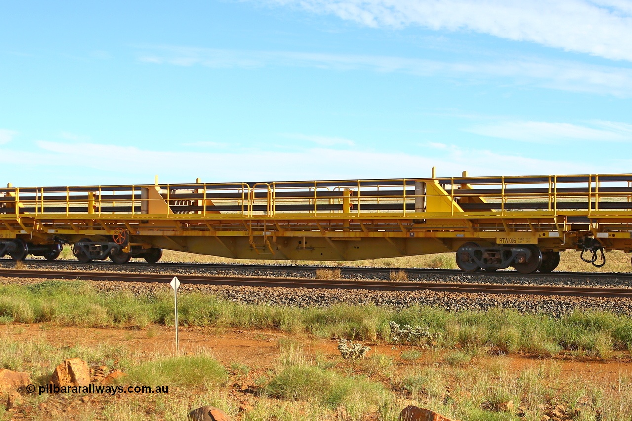 210510 1115
Near Gull on the Rio Tinto Dampier - Tom Price line at the 101.5 km, RTW type intermediate rail waggon RTW 005 on Rio Tinto's Gemco Rail built rail train consist. 10th May 2021. [url=https://goo.gl/maps/9WbRn1E4vP6a1YbN8]Location[/url].
Keywords: RTW-type;RTW005;Gemco-Rail-WA;