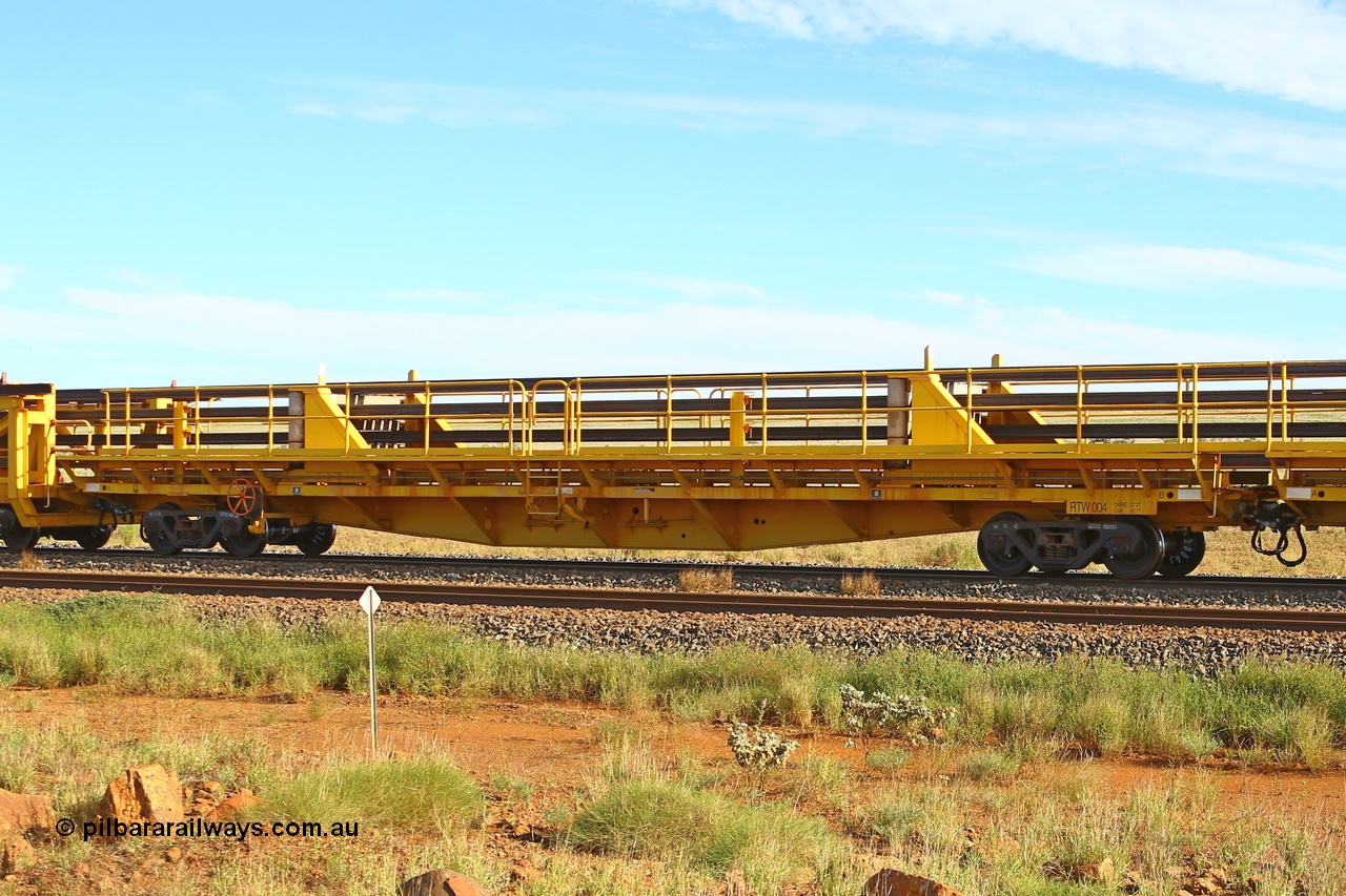 210510 1116
Near Gull on the Rio Tinto Dampier - Tom Price line at the 101.5 km, RTW type intermediate rail waggon RTW 004 on Rio Tinto's Gemco Rail built rail train consist. 10th May 2021. [url=https://goo.gl/maps/9WbRn1E4vP6a1YbN8]Location[/url].
Keywords: RTW-type;RTW004;Gemco-Rail-WA;