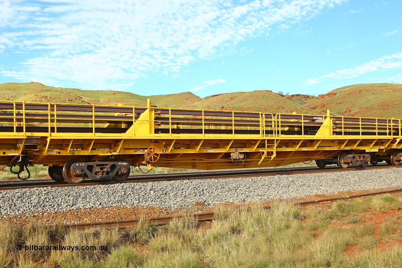 210510 1142
Near Galah on the Rio Tinto Dampier - Tom Price line at the 89.5 km, RTW type intermediate rail waggon RTW 011 on Rio Tinto's Gemco Rail built rail train consist. 10th May 2021. [url=https://goo.gl/maps/tSmgEtp7gcG7x24b9]Location[/url].
Keywords: RTW-type;RTW011;Gemco-Rail-WA;