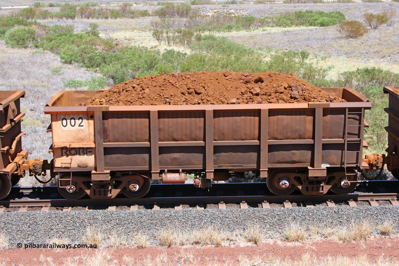 0002 081209 0167
Robe River ore waggon 002, built by Nippon Sharyo Nihon, non-handbrake side loaded view at the 7 km location just south of Cape Lambert yard. December 9, 2008.
Keywords: 002;Nippon-Sharyo-Nihon;Robe-ore-waggon;