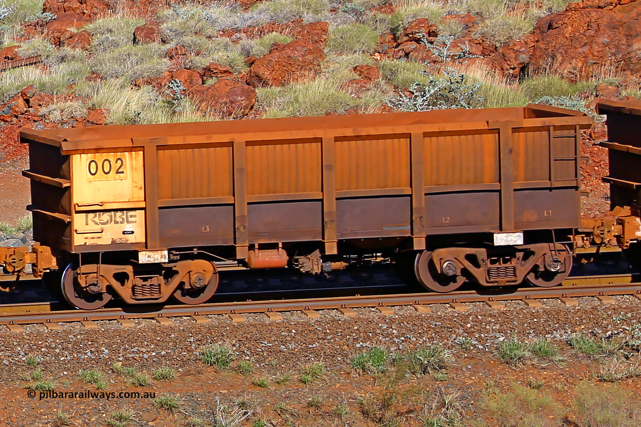 0002 180616 1713
Robe River ore waggon 002, built by Nippon Sharyo Nihon, rotary coupler end non-handbrake side empty view at the 38 km, Harding on the Cape Lambert line, June 16, 2018.
Keywords: 002;Nippon-Sharyo-Nihon;Robe-ore-waggon;