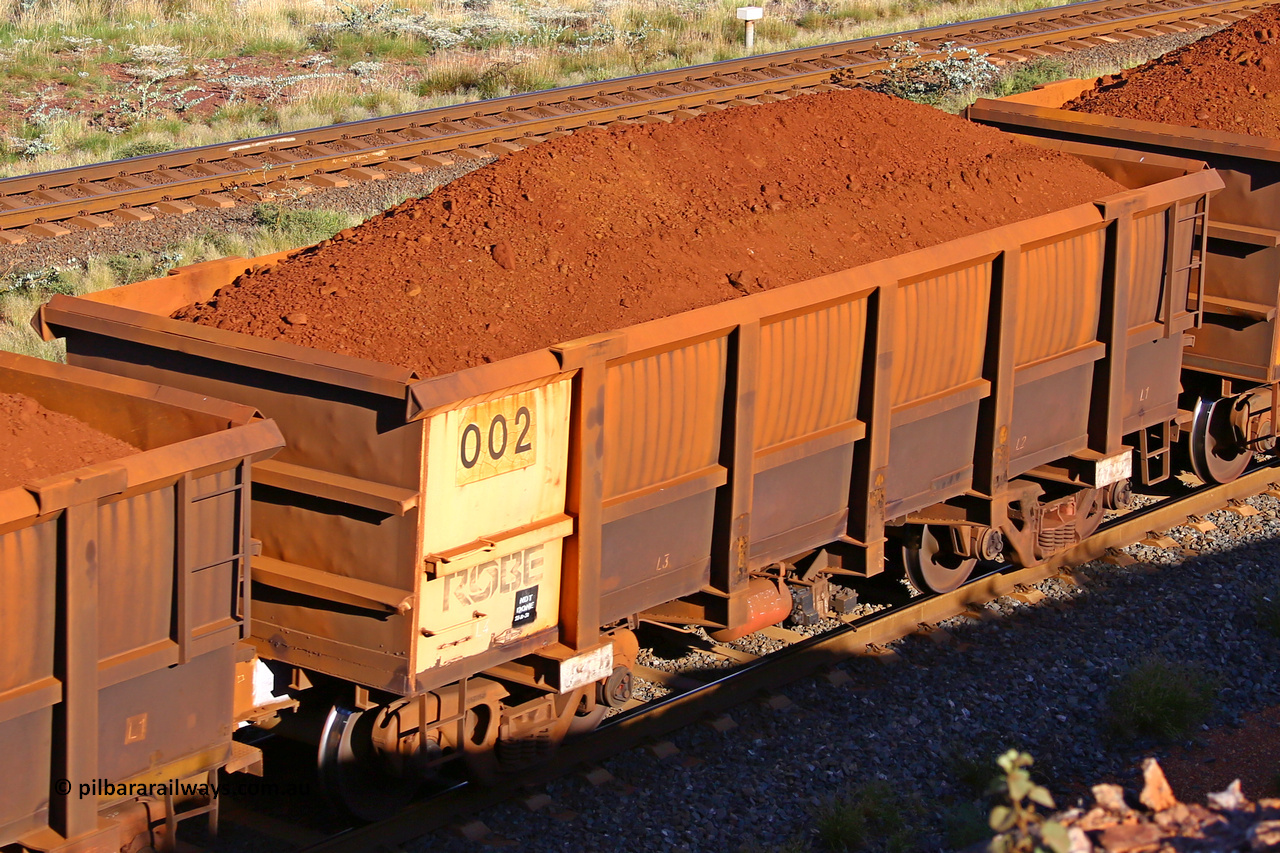 0002 210322 9770
Robe River ore waggon 002, built by Nippon Sharyo Nihon, rotary coupler end non-handbrake side loaded view at the 17 km on the Cape Lambert line, March 22, 2021.
Keywords: 002;Nippon-Sharyo-Nihon;Robe-ore-waggon;