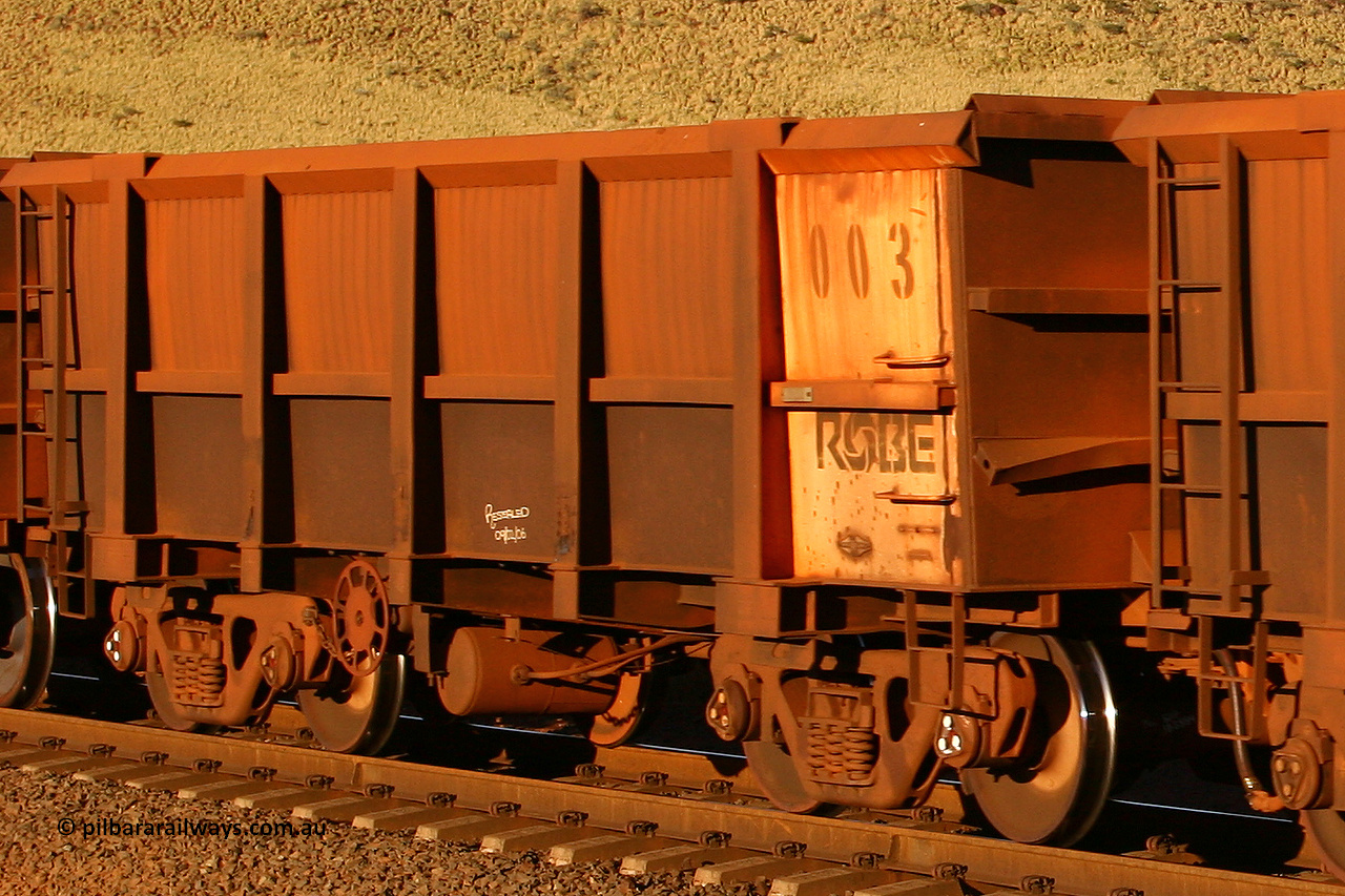 0003 060722 7618
Robe River ore waggon 003, built by Nippon Sharyo Nihon, rotary coupler end handbrake side empty view at the 11.7 km, Cape Lambert. July 22, 2006.
Keywords: 003;Nippon-Sharyo-Nihon;Robe-ore-waggon;