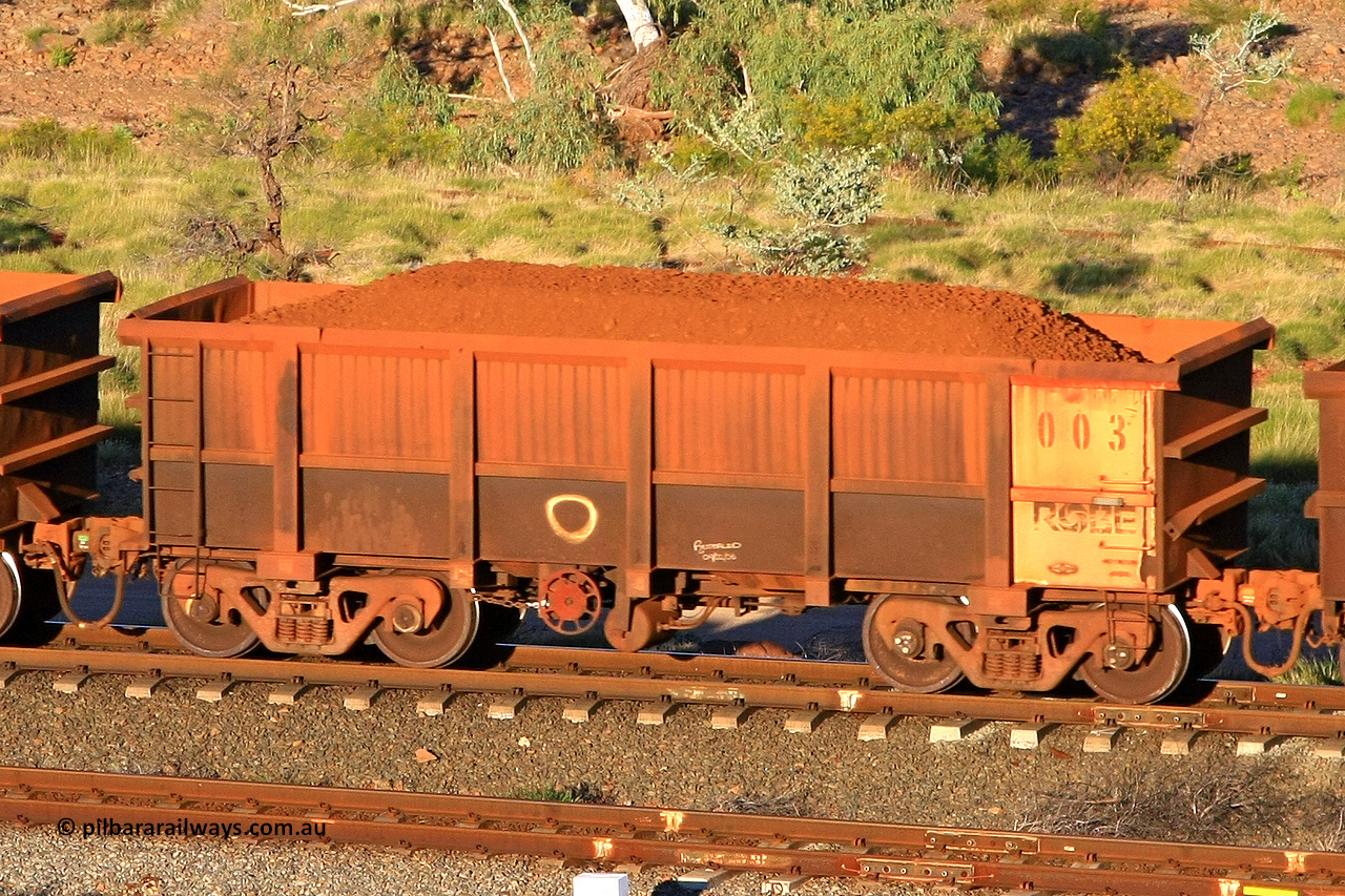 0003 110602 1629
Robe River ore waggon 003, built by Nippon Sharyo Nihon, rotary coupler end handbrake side loaded view at the 71 km, Western Creek on the Deepdale line. June 2, 2011.
Keywords: 003;Nippon-Sharyo-Nihon;Robe-ore-waggon;