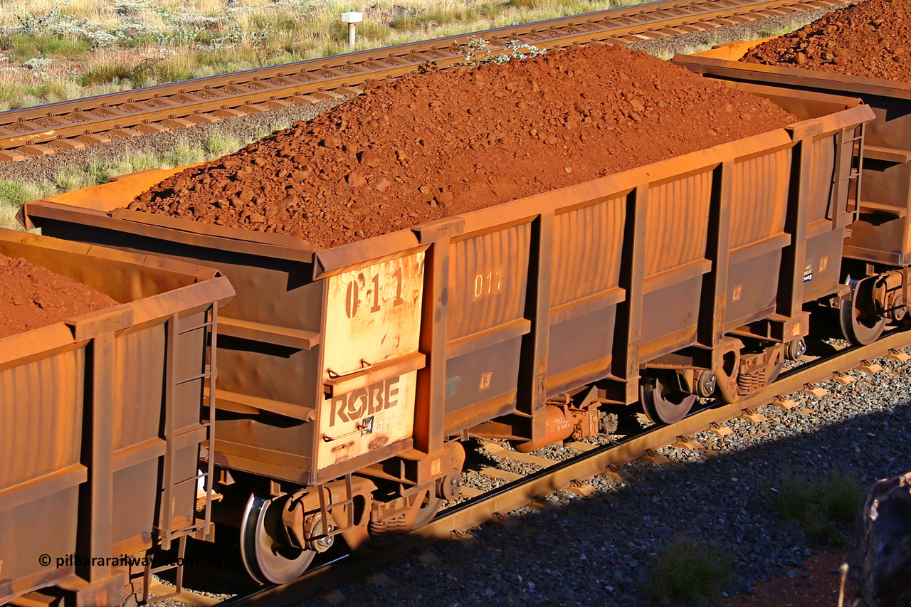 0011 210322 9782
Robe River ore waggon 011, built by Nippon Sharyo Nihon, rotary coupler end non-handbrake side loaded view at the 17 km on the Cape Lambert line, March 22, 2021.
Keywords: 011;Nippon-Sharyo-Nihon;Robe-ore-waggon;