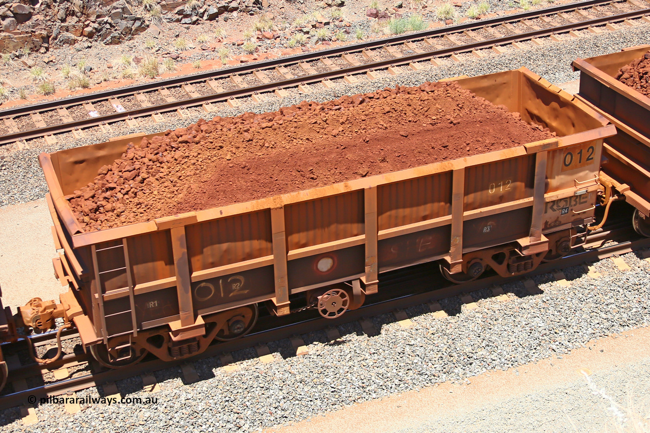 0012 160306 1473
Robe River ore waggon 012, built by Nippon Sharyo Nihon, fixed coupler handbrake side loaded view at the 45 km, Harding Siding on the Cape Lambert line. March 6, 2016.
Keywords: 012;Nippon-Sharyo-Nihon;Robe-ore-waggon;