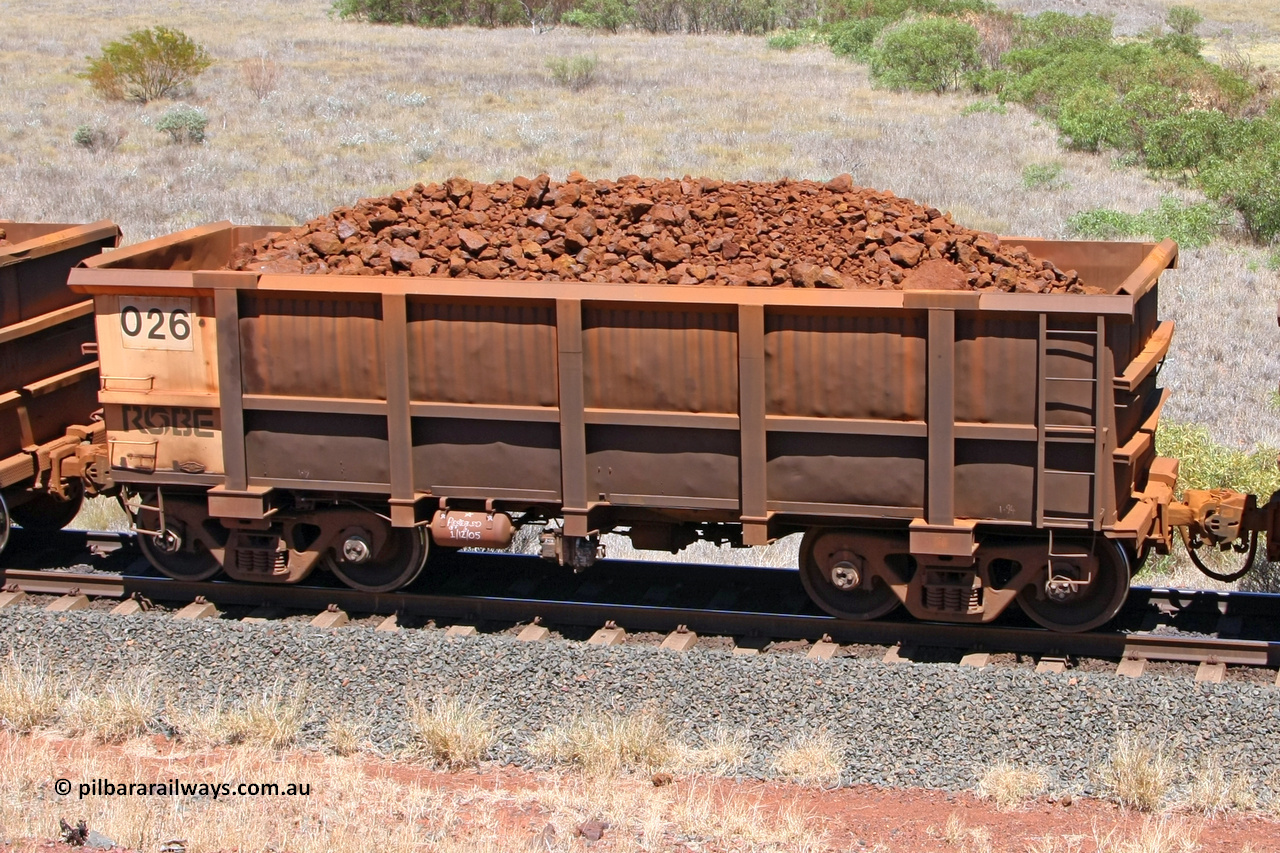 0026 081209 0153
Robe River ore waggon 026, built by Nippon Sharyo Nihon, non-handbrake side loaded view at the 7 km location just south of Cape Lambert yard. December 9, 2008.
Keywords: 026;Nippon-Sharyo-Nihon;Robe-ore-waggon;