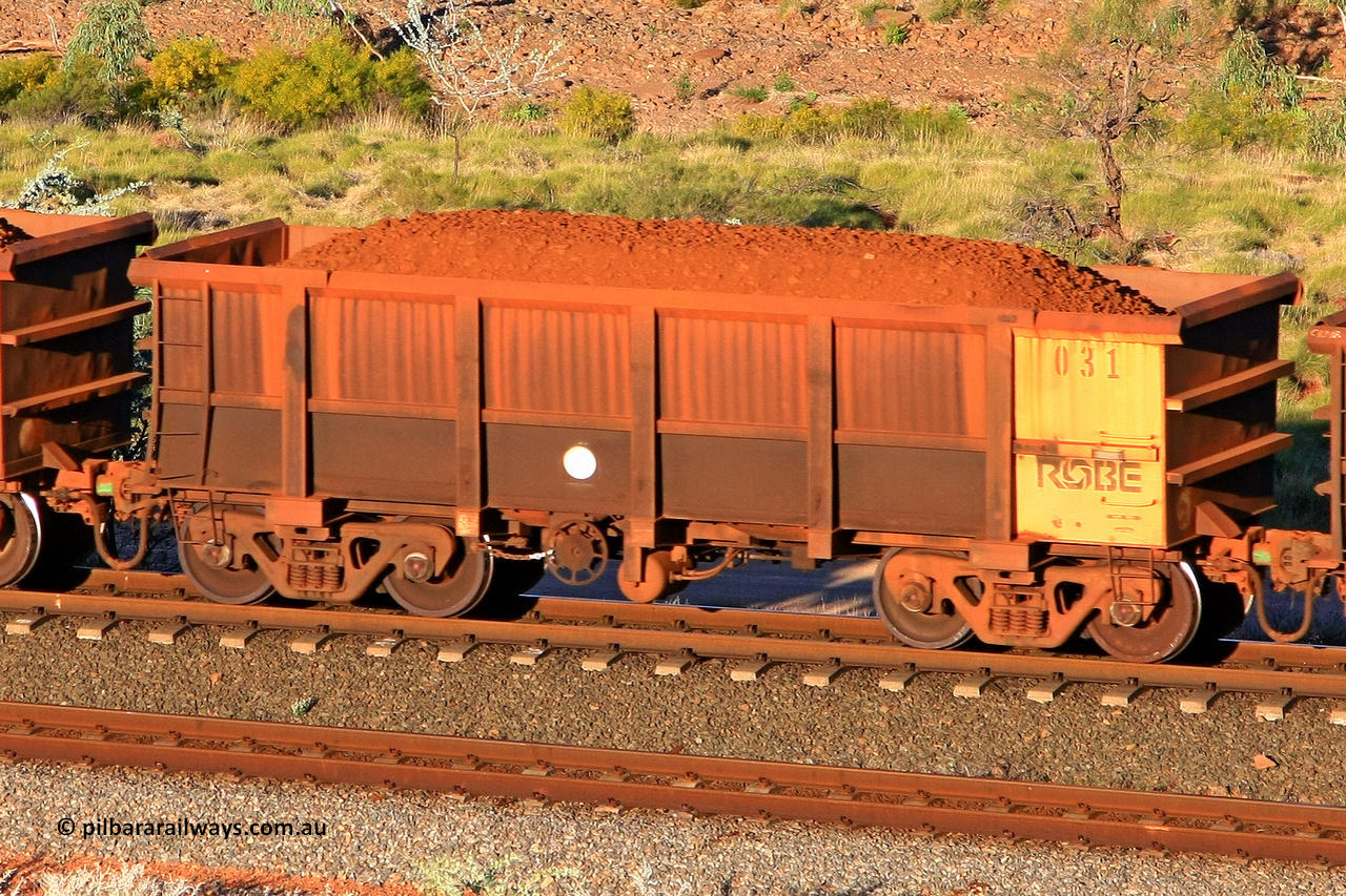 0031 110602 1721
Robe River ore waggon 031, built by Nippon Sharyo Nihon, rotary coupler end handbrake side loaded view at the 71 km, Western Creek on the Deepdale line. June 2, 2011.
Keywords: 031;Nippon-Sharyo-Nihon;Robe-ore-waggon;
