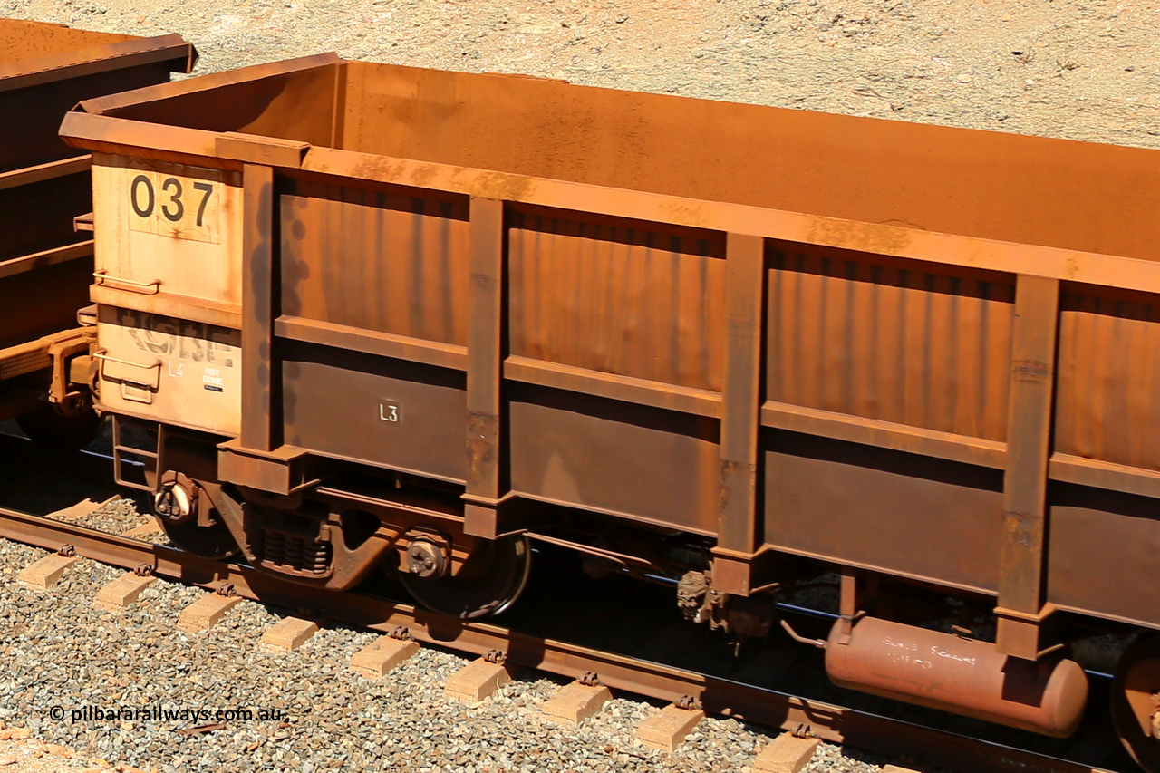 0037 160306 1276
Robe River ore waggon 037, built by Centurion Industries WA, rotary coupler non-handbrake side empty view with Centurion Industries waybill holder and no visible plate markings, suspected replacement built body, at Greenpool on the Cape Lambert line. March 6, 2016.
Keywords: 037;Centurion-Industries-WA;Robe-ore-waggon;