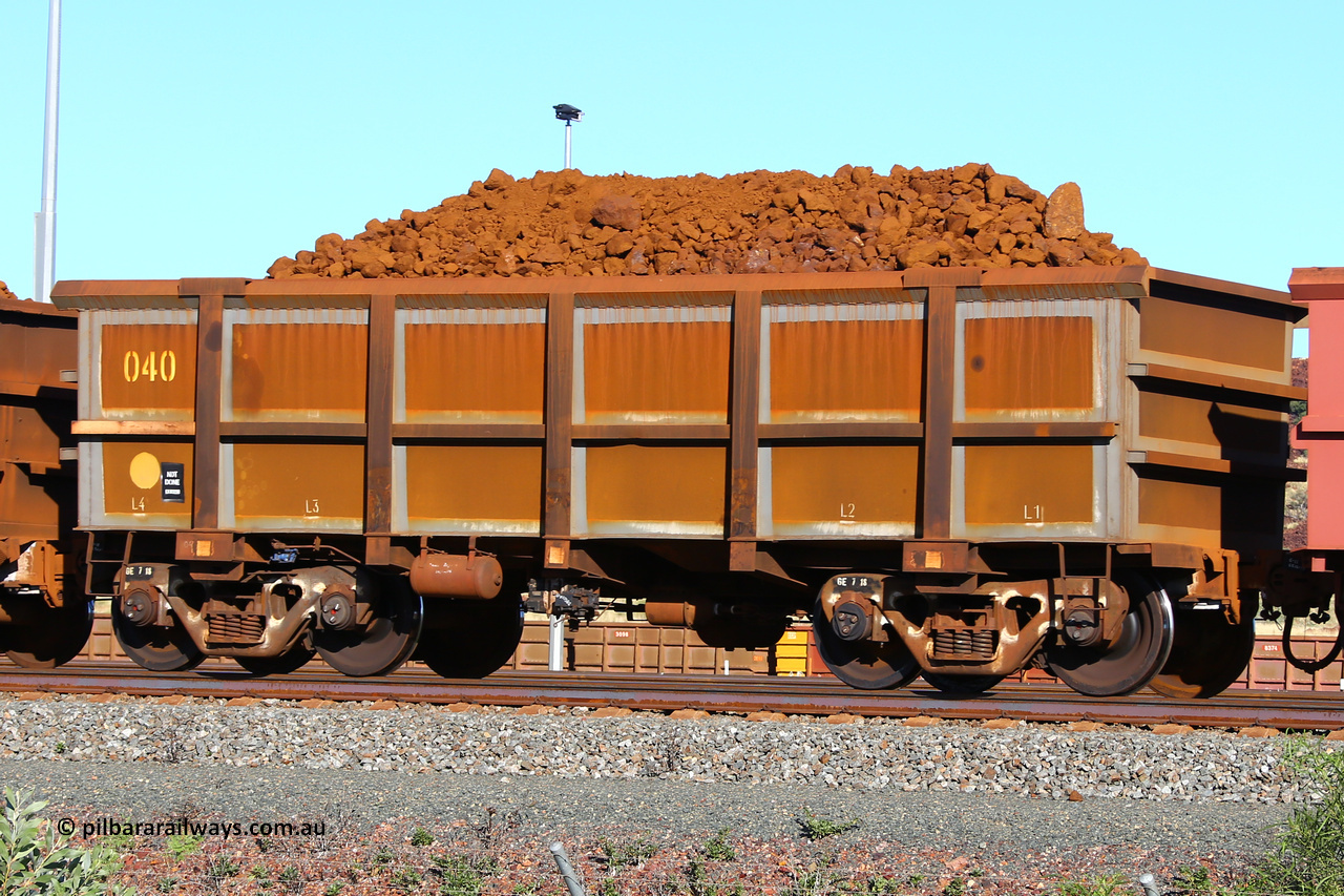 0040 210322 9388
Robe River ore waggon 040, built by Nippon Sharyo Nihon, fixed coupler non-handbrake side loaded view at Cape Lambert yard, waggon has been completely resheeted, March 22, 2021.
Keywords: 040;Nippon-Sharyo-Nihon;Robe-ore-waggon;