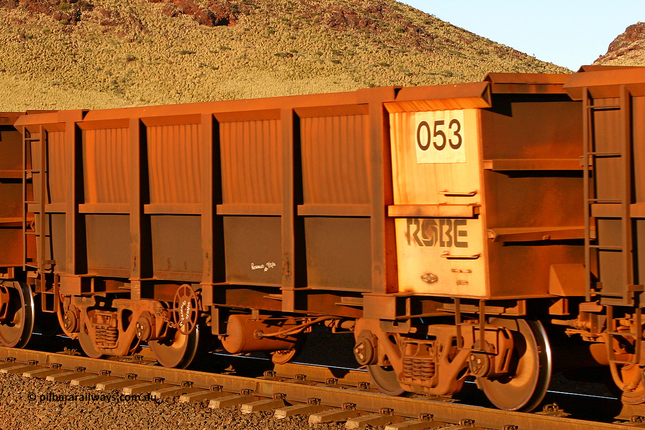 0053 060722 7592
Robe River ore waggon 053, built by Nippon Sharyo Nihon, rotary coupler end handbrake side empty view at the 11.7 km, Cape Lambert. July 22, 2006.
Keywords: 053;Nippon-Sharyo-Nihon;Robe-ore-waggon;