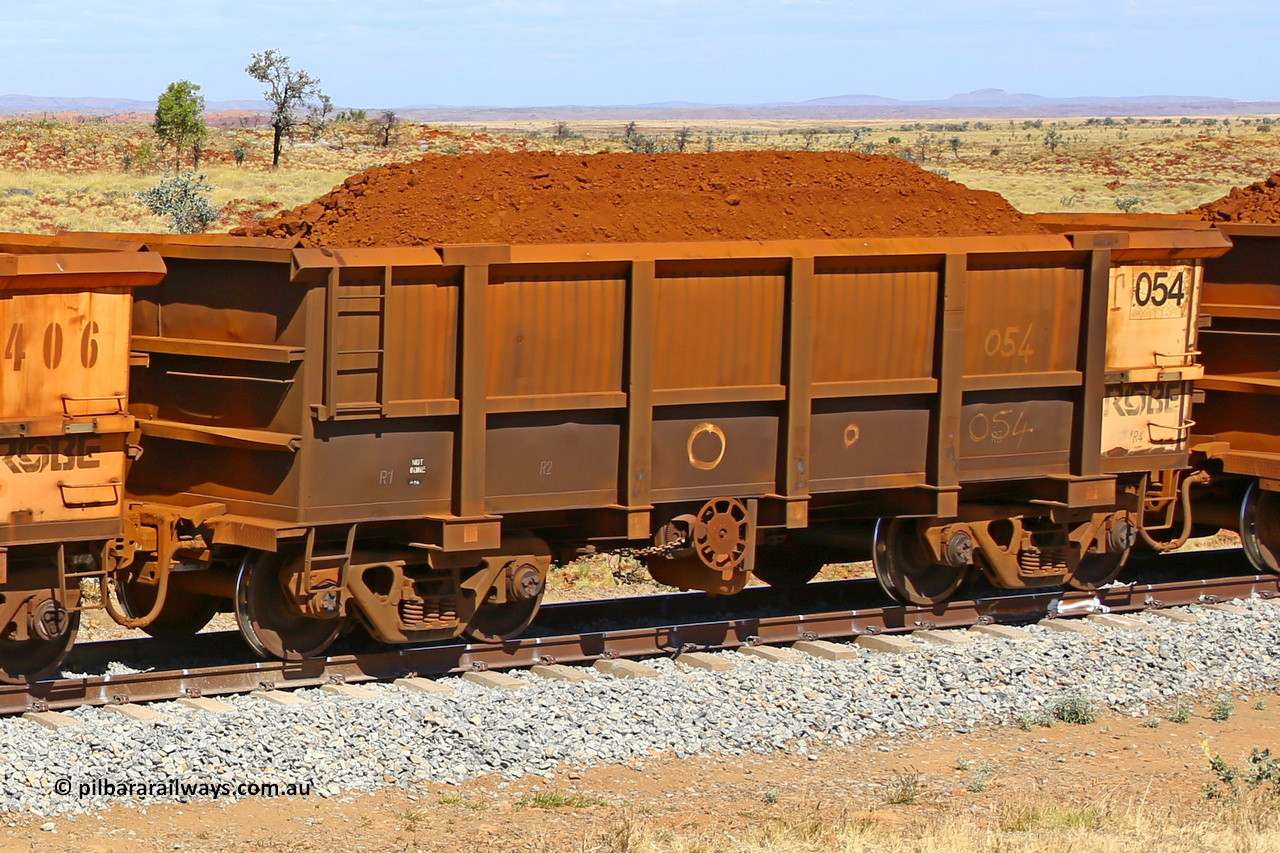 0054 170729 0253
Robe River ore waggon 054, built by Nippon Sharyo Nihon, fixed coupler handbrake side loaded view at the 103 km, between Maitland Siding and the Fortescue River on the Deepdale line. July 29, 2017.
Keywords: 054;Nippon-Sharyo-Nihon;Robe-ore-waggon;