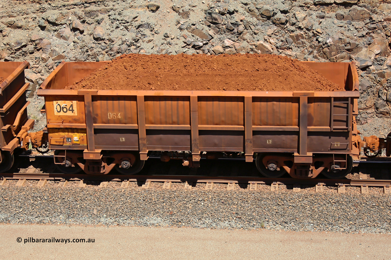 0064 160306 1548
Robe River ore waggon 064, built by Nippon Sharyo Nihon, fixed coupler non-handbrake side loaded view at the 45 km, Harding Siding on the Cape Lambert line. March 6, 2016.
Keywords: 064;Nippon-Sharyo-Nihon;Robe-ore-waggon;