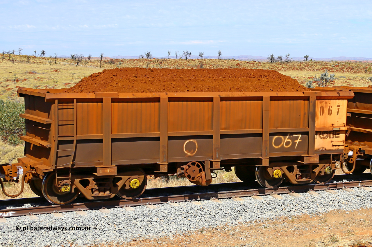 0067 170729 0239
Robe River ore waggon 067, built by Nippon Sharyo Nihon, fixed coupler handbrake side loaded view at the 103 km, between Maitland Siding and the Fortescue River on the Deepdale line. July 29, 2017.
Keywords: 067;Nippon-Sharyo-Nihon;Robe-ore-waggon;