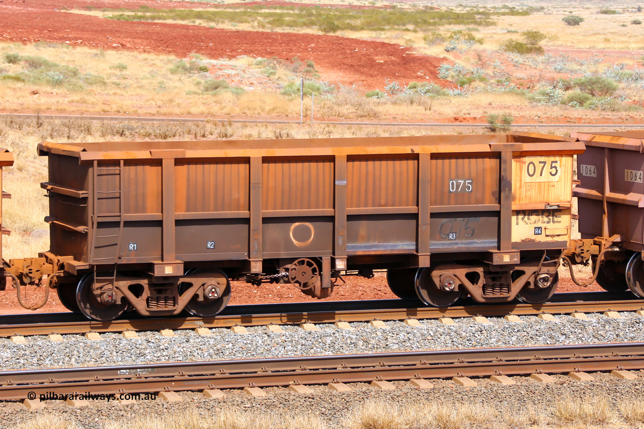 0075 141124 6868
Robe River ore waggon 075, built by Nippon Sharyo Nihon, fixed coupler handbrake side empty view at the 25 km at Arches Siding on the Cape Lambert line. November 24, 2014.
Keywords: 075;Nippon-Sharyo-Nihon;Robe-ore-waggon;