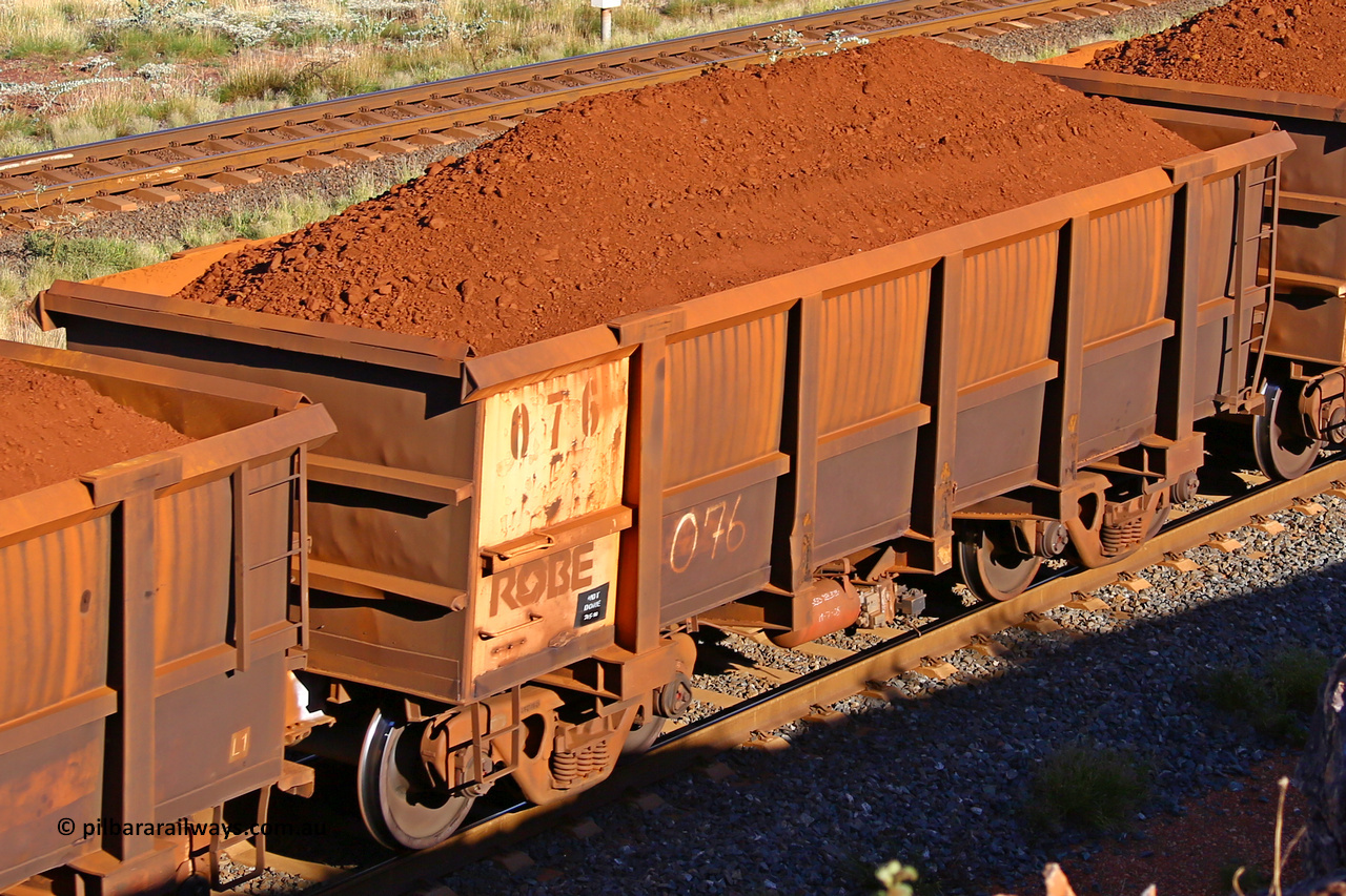 0076 210322 9703
Robe River ore waggon 076, built by Nippon Sharyo Nihon, rotary coupler end non-handbrake side loaded view at the 17 km on the Cape Lambert line, March 22, 2021.
Keywords: 076;Nippon-Sharyo-Nihon;Robe-ore-waggon;