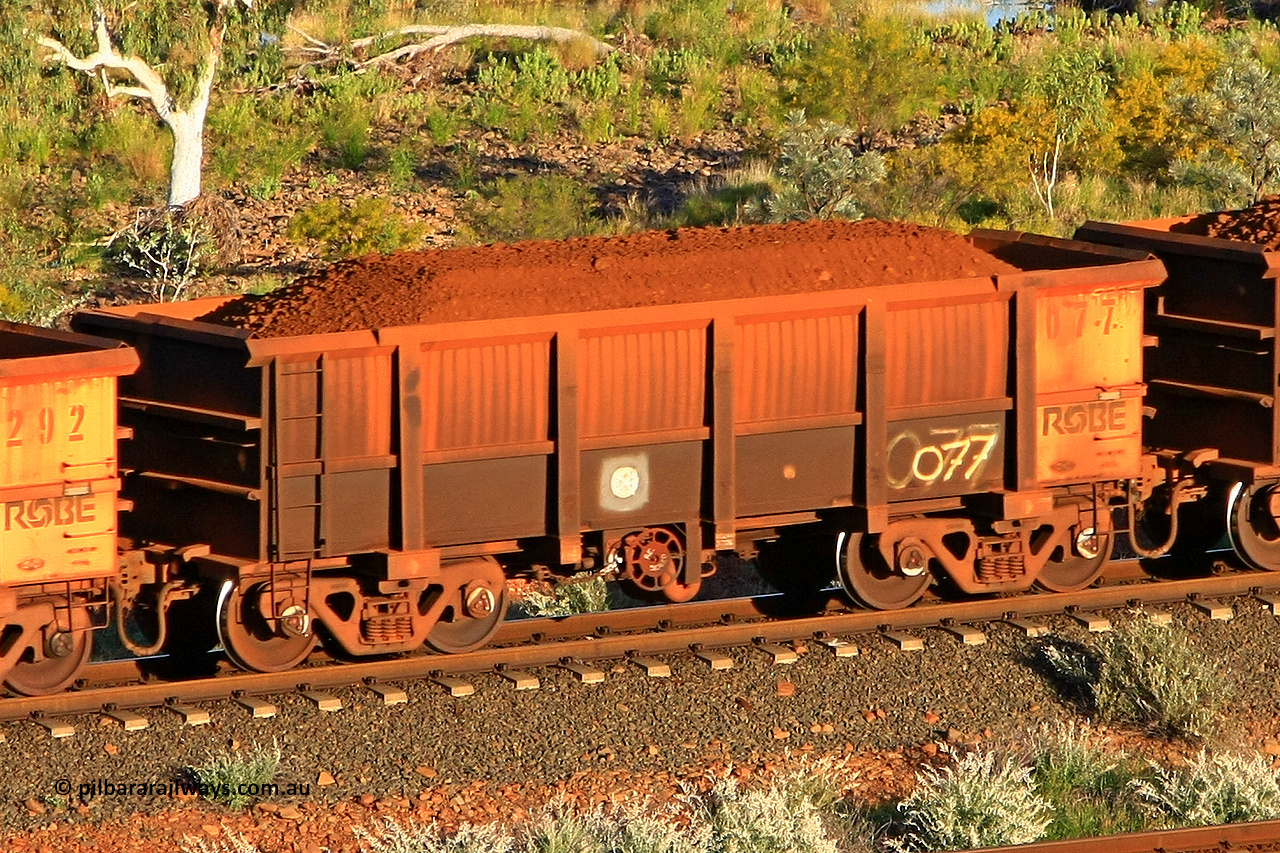 0077 110602 1595
Robe River ore waggon 077, built by Nippon Sharyo Nihon, fixed coupler handbrake side loaded view at the 71 km, Western Creek on the Deepdale line. June 2, 2011.
Keywords: 077;Nippon-Sharyo-Nihon;Robe-ore-waggon;