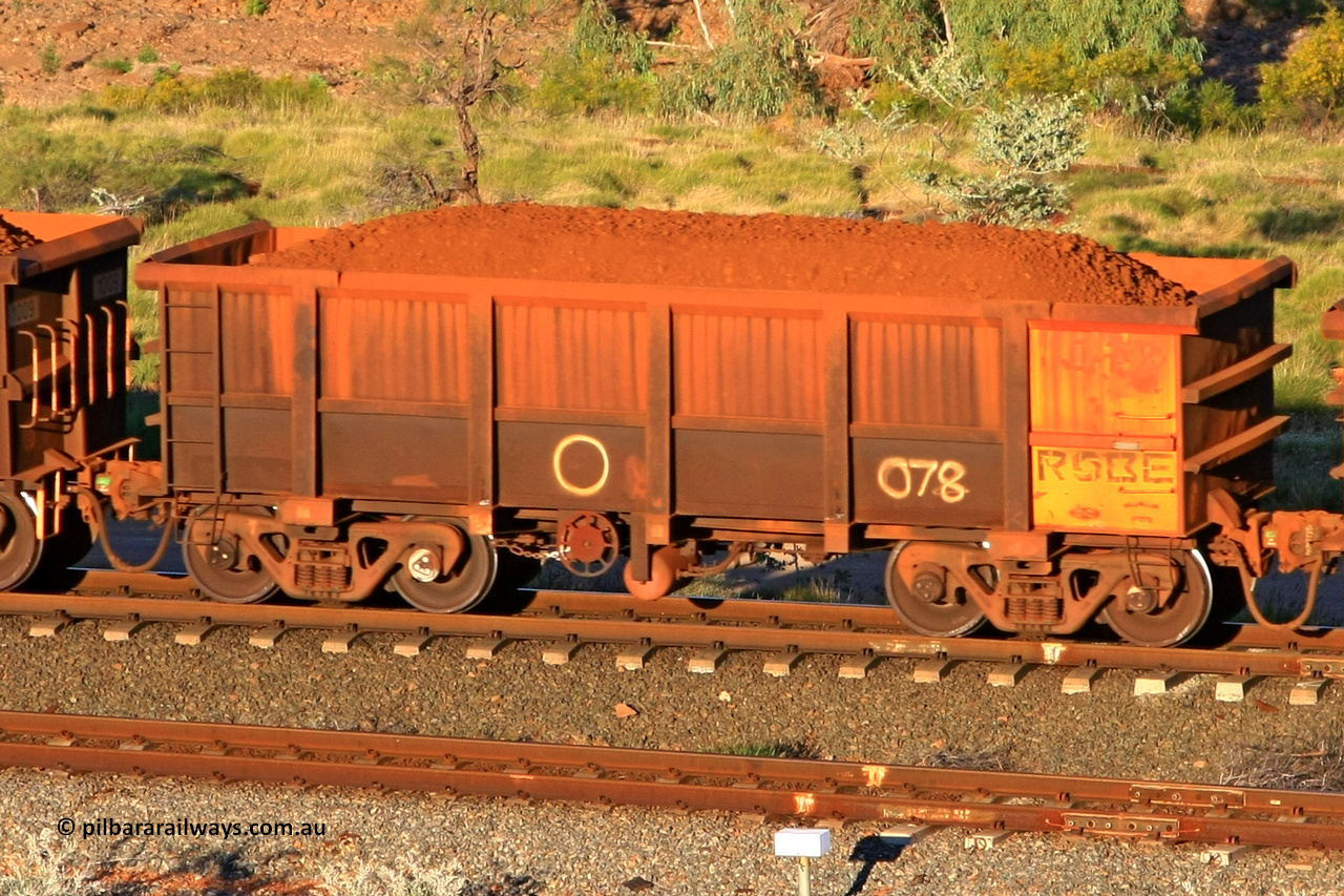 0078 110602 1631
Robe River ore waggon 078, built by Nippon Sharyo Nihon, rotary coupler end handbrake side loaded view at the 71 km, Western Creek on the Deepdale line. June 2, 2011.
Keywords: 078;Nippon-Sharyo-Nihon;Robe-ore-waggon;
