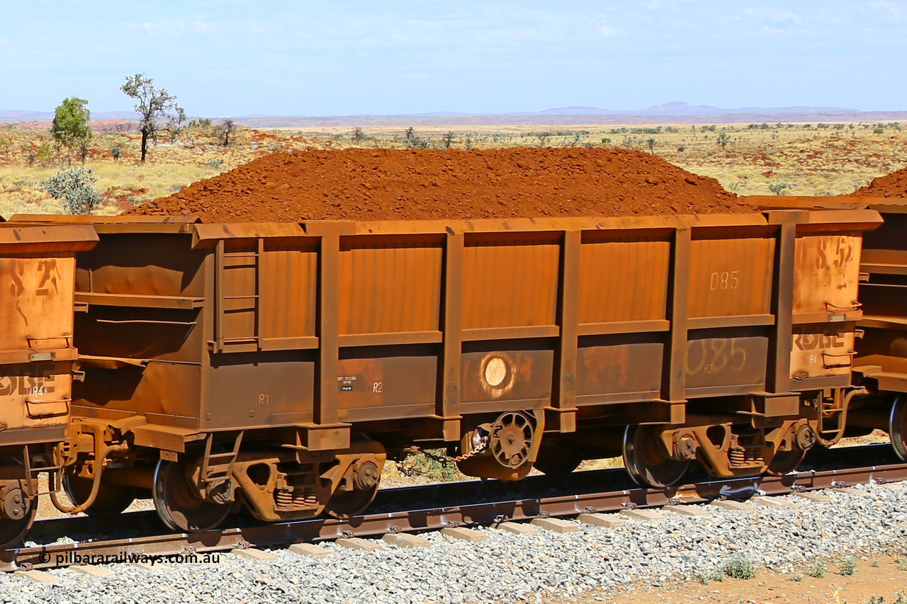 0085 170729 0216
Robe River ore waggon 085, built by Nippon Sharyo Nihon, fixed coupler handbrake side loaded view at the 103 km, between Maitland Siding and the Fortescue River on the Deepdale line. July 29, 2017.
Keywords: 085;Nippon-Sharyo-Nihon;Robe-ore-waggon;
