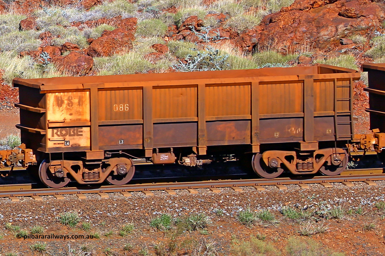 0086 180616 1711
Robe River ore waggon 086, built by Nippon Sharyo Nihon, rotary coupler end non-handbrake side empty view at the 38 km, Harding on the Cape Lambert line, June 16, 2018.
Keywords: 086;Nippon-Sharyo-Nihon;Robe-ore-waggon;