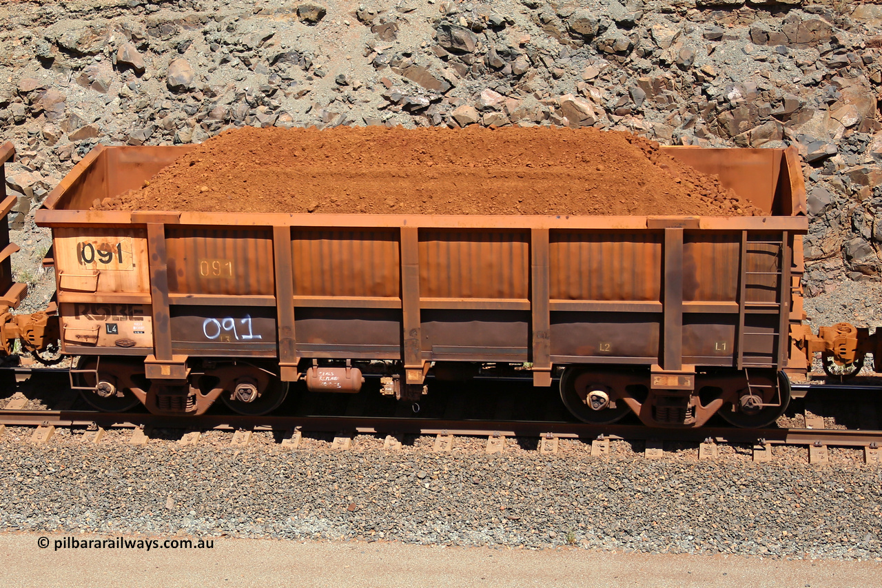 0091 160306 1554
Robe River ore waggon 091, built by Nippon Sharyo Nihon, fixed coupler non-handbrake side loaded view at the 45 km, Harding Siding on the Cape Lambert line. March 6, 2016.
Keywords: 091;Nippon-Sharyo-Nihon;Robe-ore-waggon;