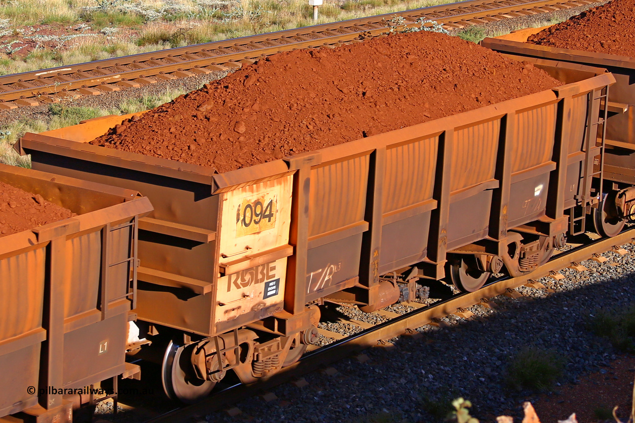 0094 210322 9749
Robe River ore waggon 094, built by Nippon Sharyo Nihon, rotary coupler end non-handbrake side loaded view at the 17 km on the Cape Lambert line, March 22, 2021.
Keywords: 094;Nippon-Sharyo-Nihon;Robe-ore-waggon;