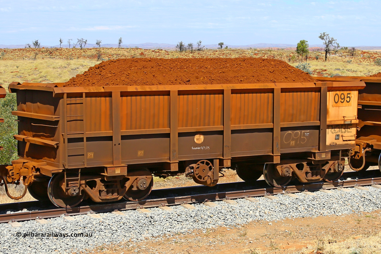 0095 170729 0223
Robe River ore waggon 095, built by Nippon Sharyo Nihon, fixed coupler handbrake side loaded view at the 103 km, between Maitland Siding and the Fortescue River on the Deepdale line. July 29, 2017.
Keywords: 095;Nippon-Sharyo-Nihon;Robe-ore-waggon;