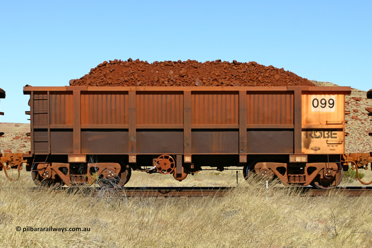 0099 060722 7521
Robe River ore waggon 099, built by Nippon Sharyo Nihon, handbrake side loaded view at the 78.8 km between Western Creek and Maitland on the Deepdale line. July 22, 2006.
Keywords: 097;Nippon-Sharyo-Nihon;Robe-ore-waggon;