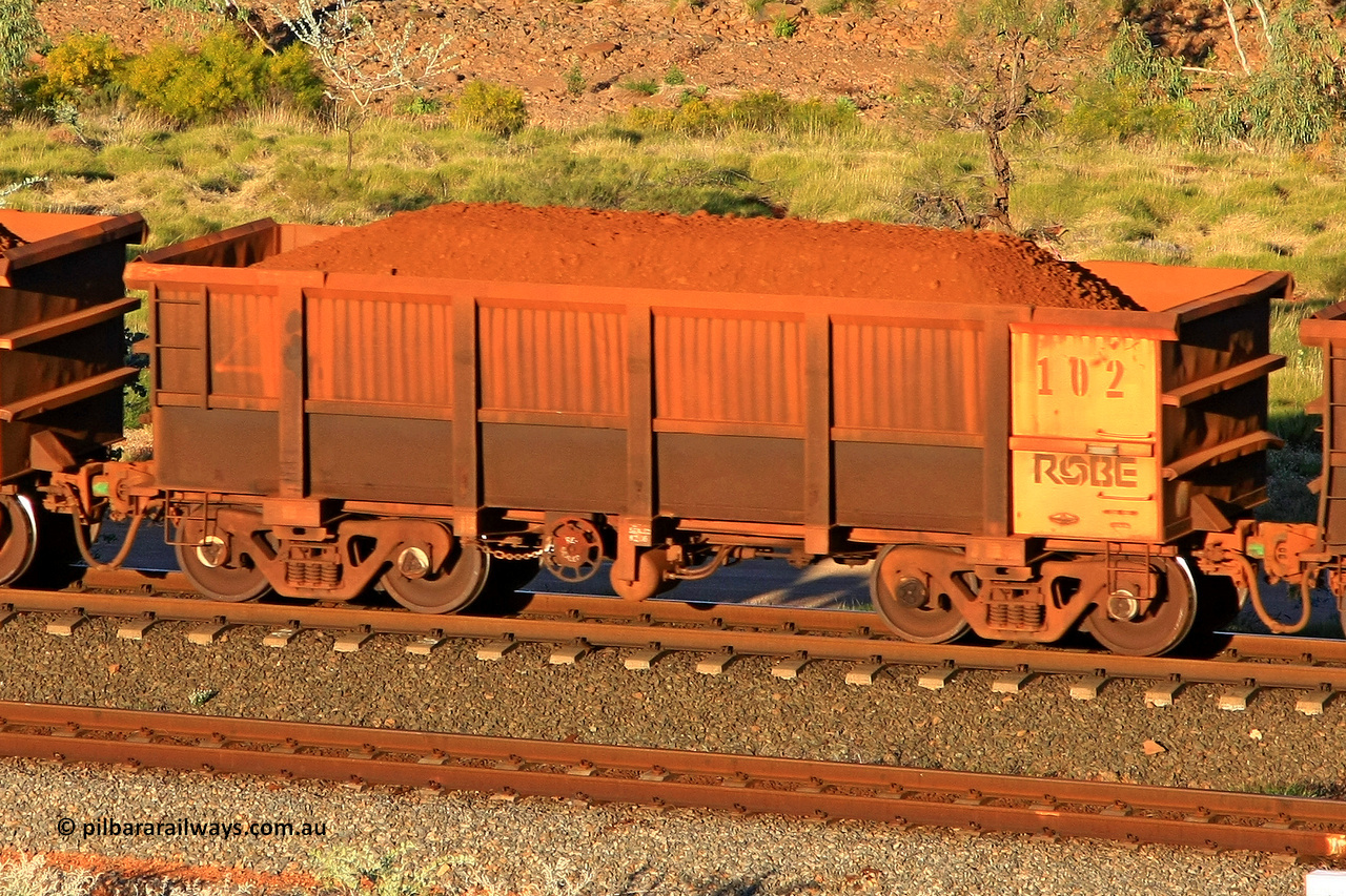 0102 110602 1689
Robe River ore waggon 102, built by Nippon Sharyo Nihon, rotary coupler end handbrake side loaded view at the 71 km, Western Creek on the Deepdale line. June 2, 2011.
Keywords: 102;Nippon-Sharyo-Nihon;Robe-ore-waggon;